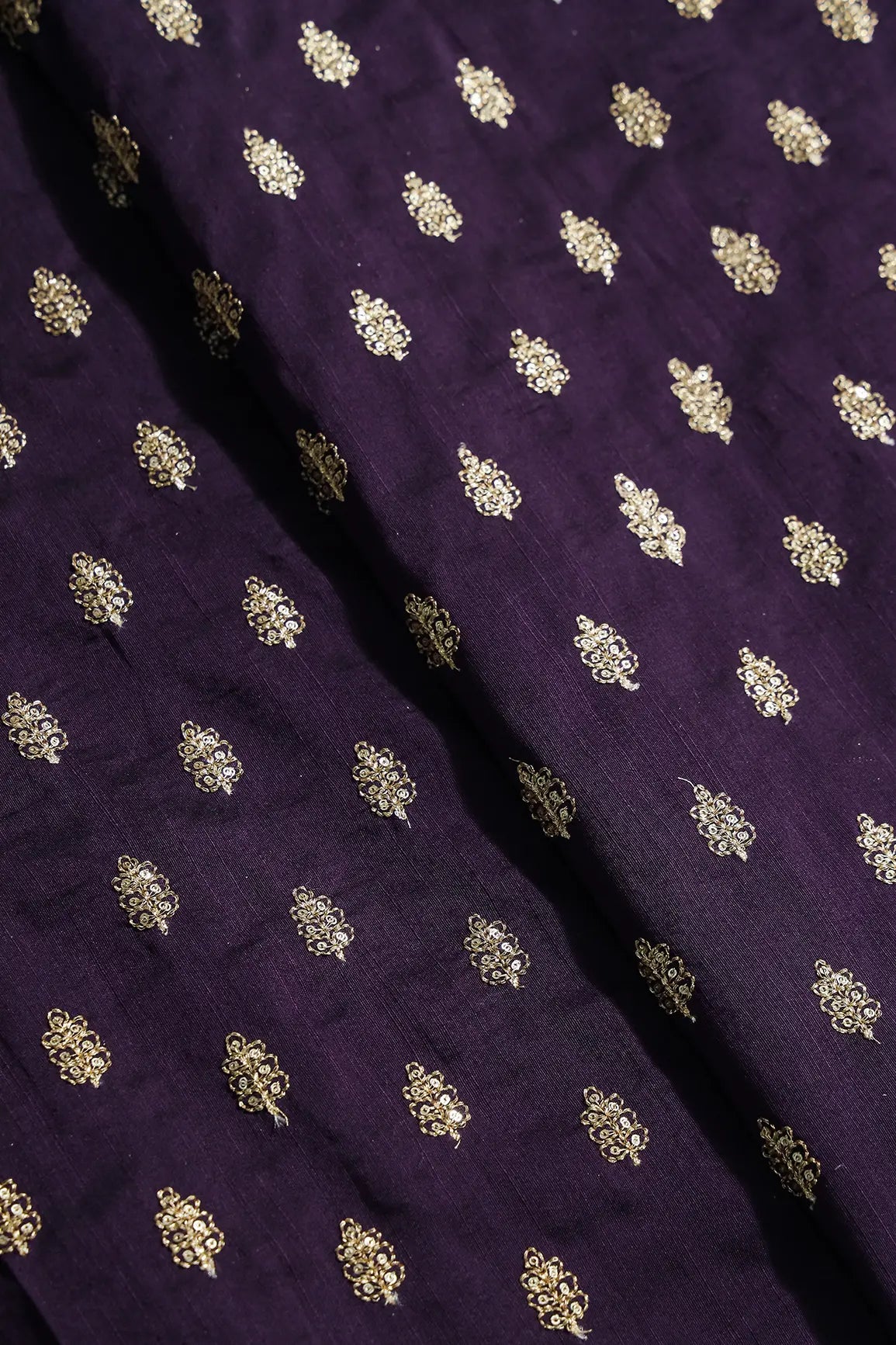 Gold Sequins With Gold Zari Small Motif Embroidery Work On Wine Raw Silk Fabric