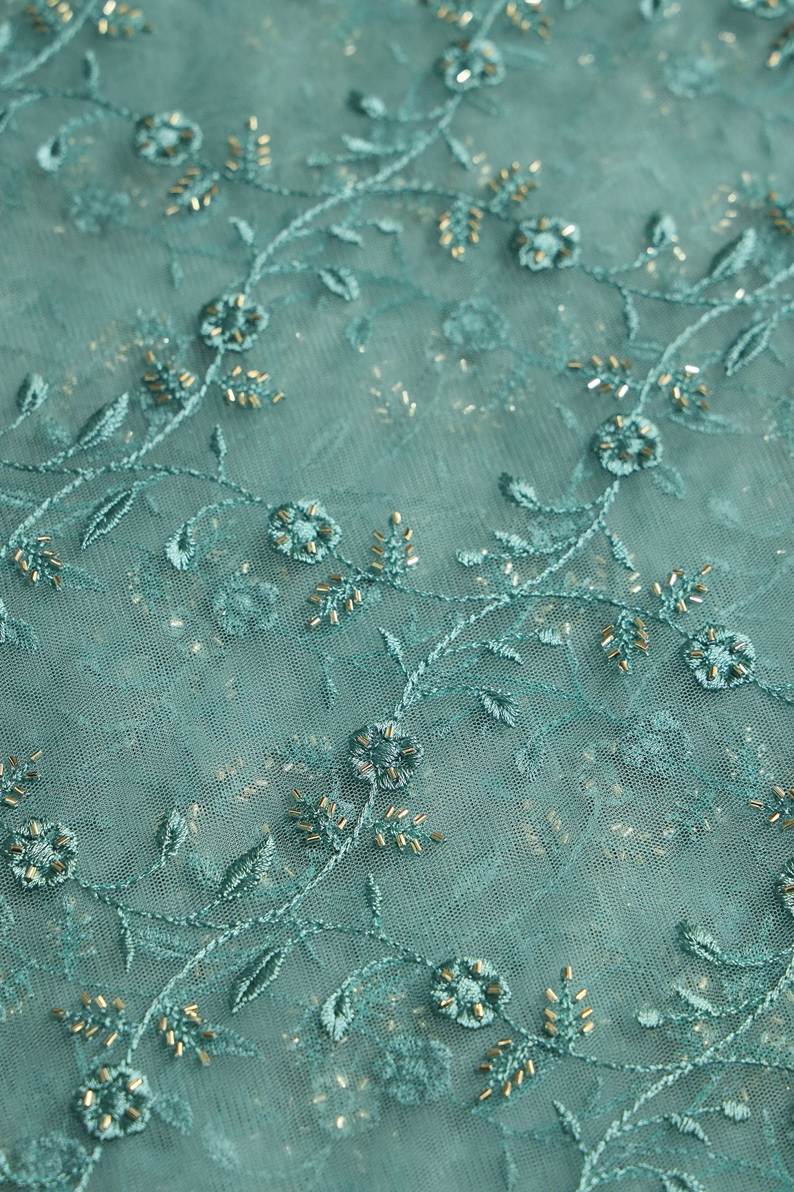 Teal Thread With Beads Floral Leafy Embroidery Work On Teal Soft Net Fabric