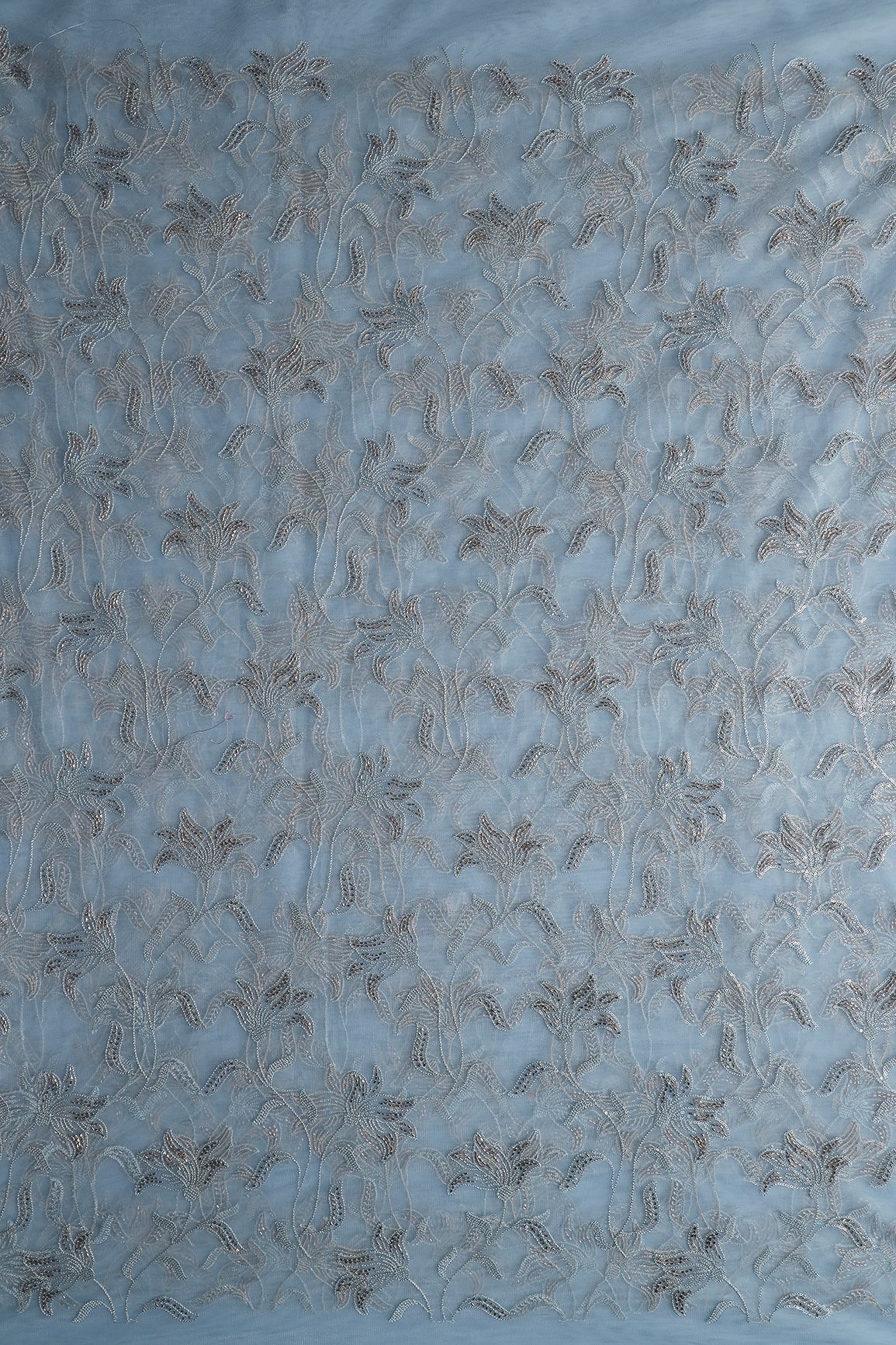 Light Blue Thread & Beads With Water Sequins Floral Leafy Embroidery Work On Light Blue Soft Net Fabric