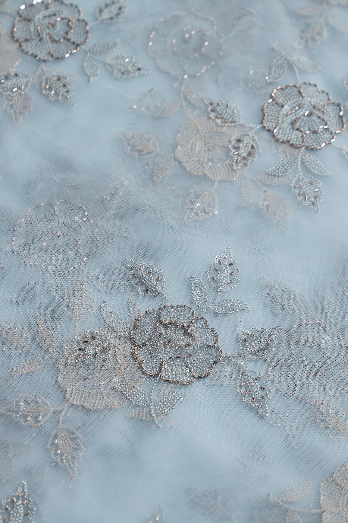 Light Blue Thread & Beads With Water Sequins Floral Embroidery Work On Light Blue Soft Net Fabric