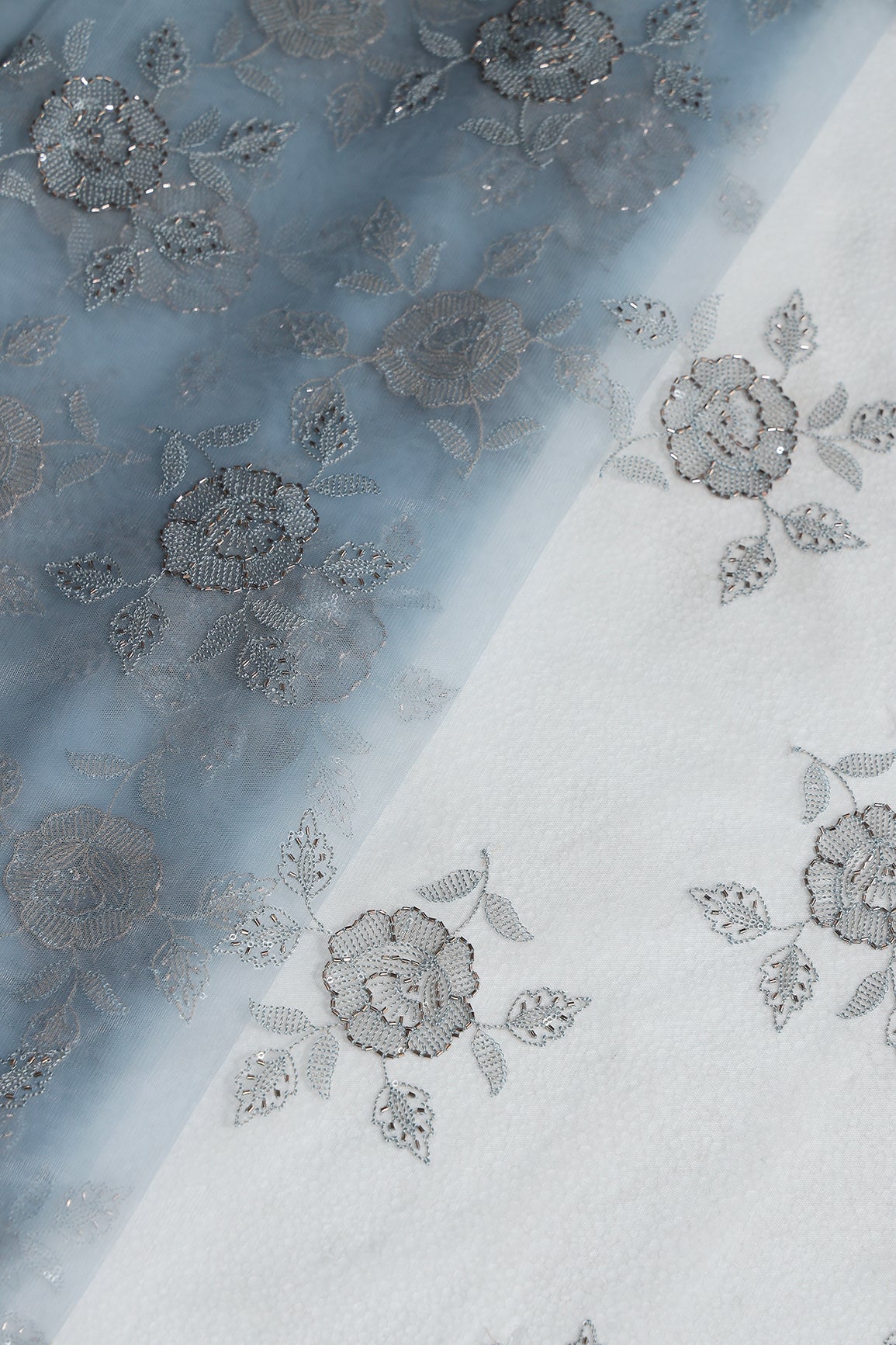 Light Blue Thread & Beads With Water Sequins Floral Embroidery Work On Light Blue Soft Net Fabric