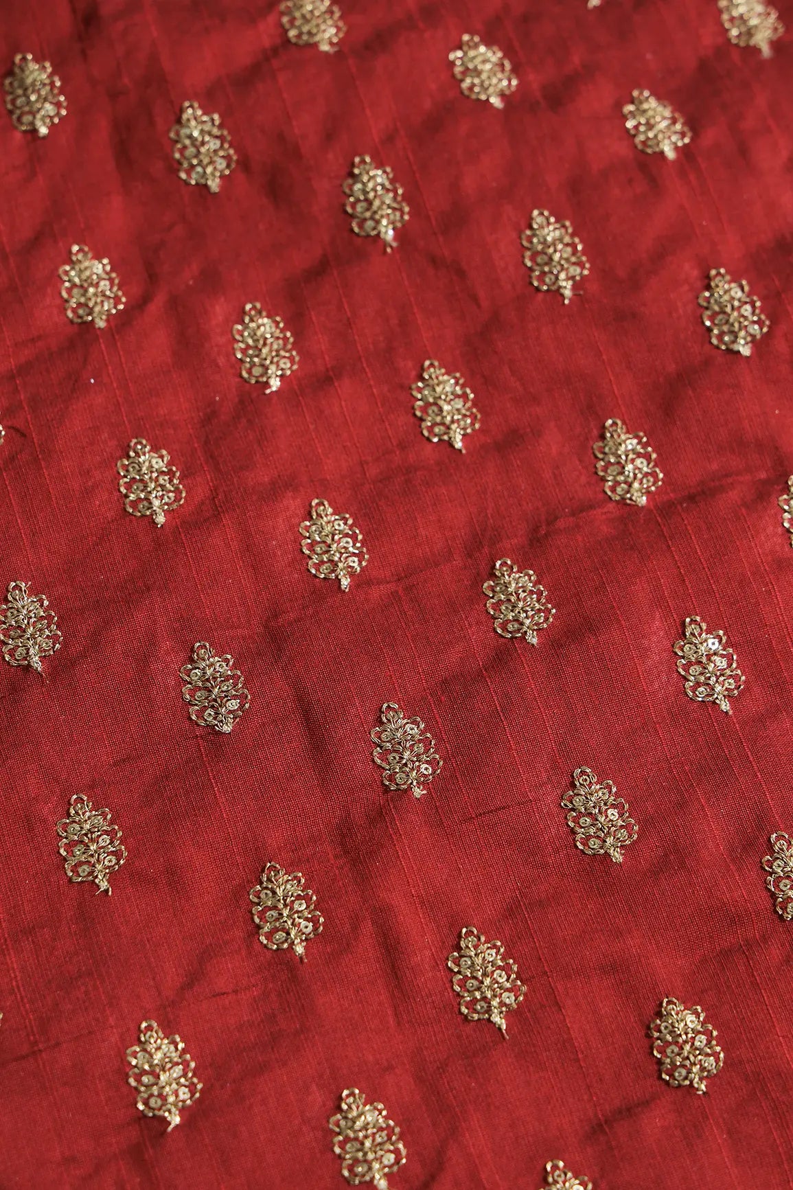 Gold Sequins With Gold Zari Small Motif Embroidery Work On Maroon Raw Silk Fabric