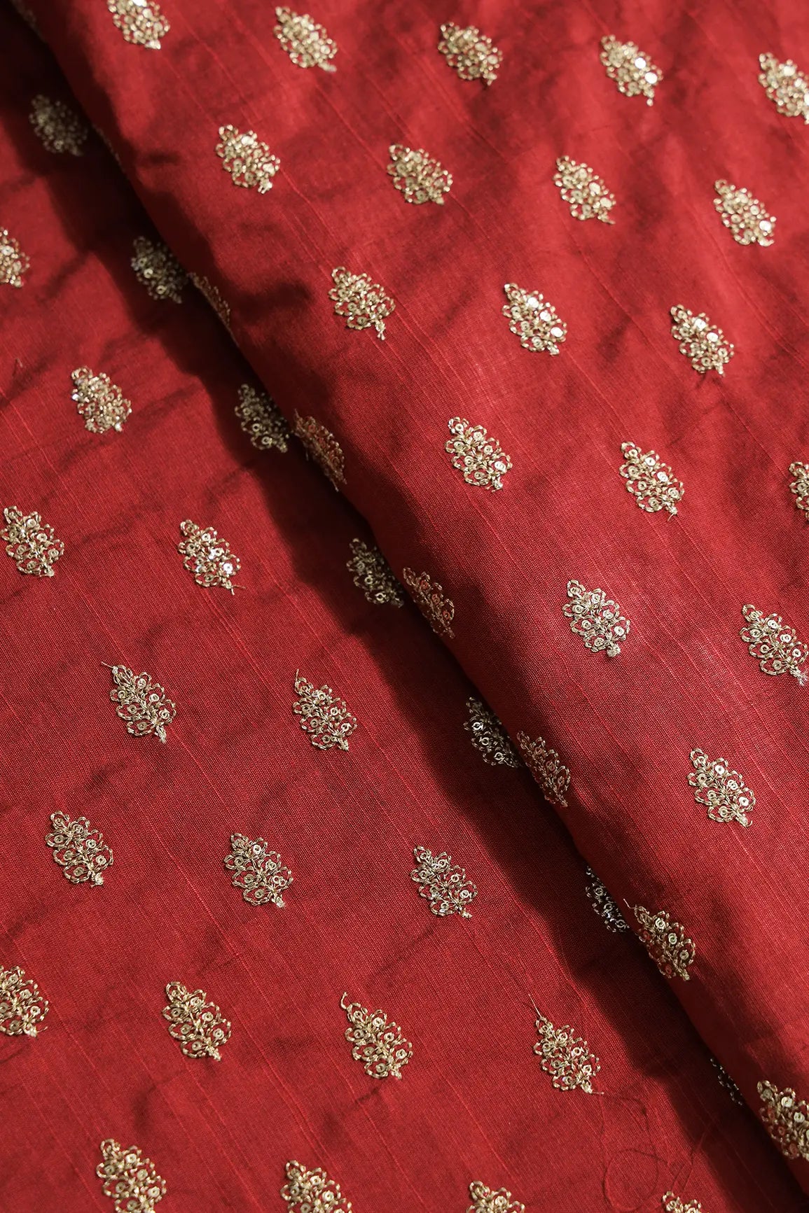 Gold Sequins With Gold Zari Small Motif Embroidery Work On Maroon Raw Silk Fabric