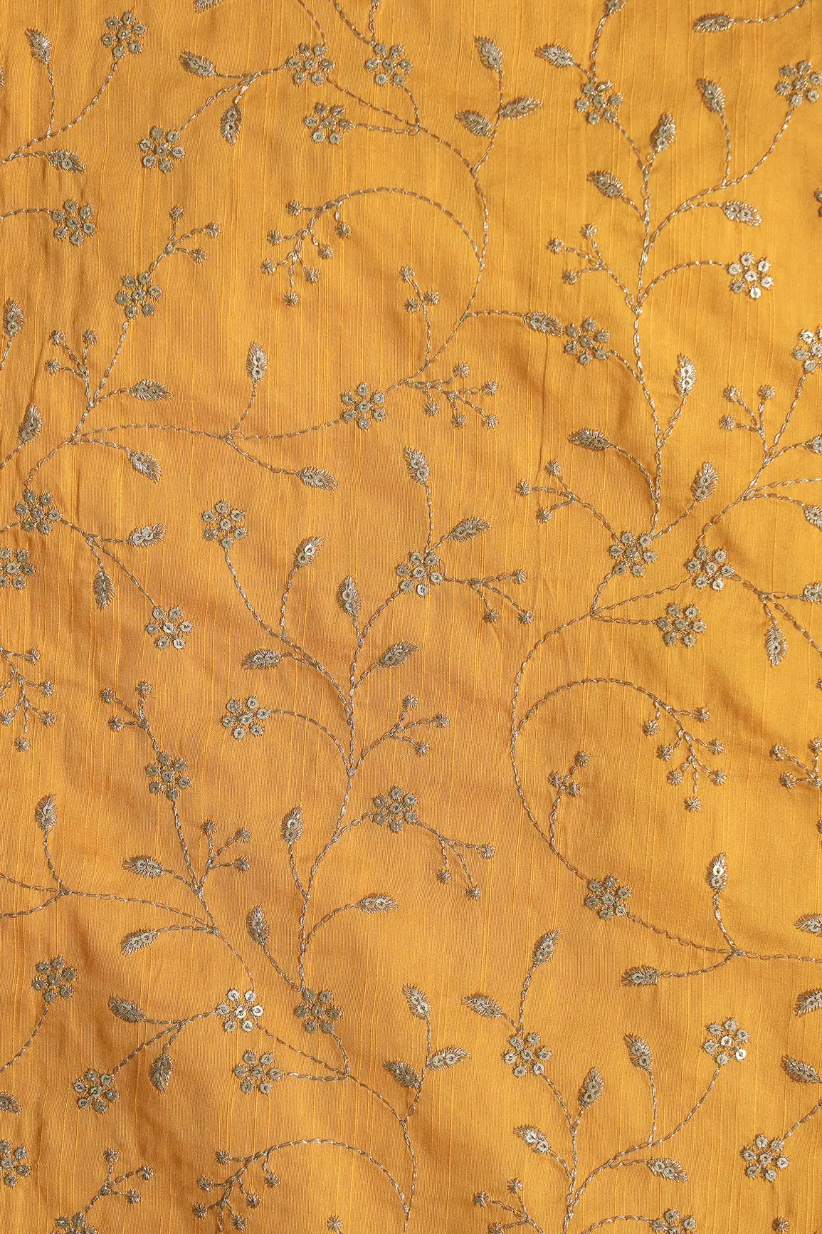 Gold Sequins With Gold Zari Floral Leafy Embroidery Work On Yellow Raw Silk Fabric