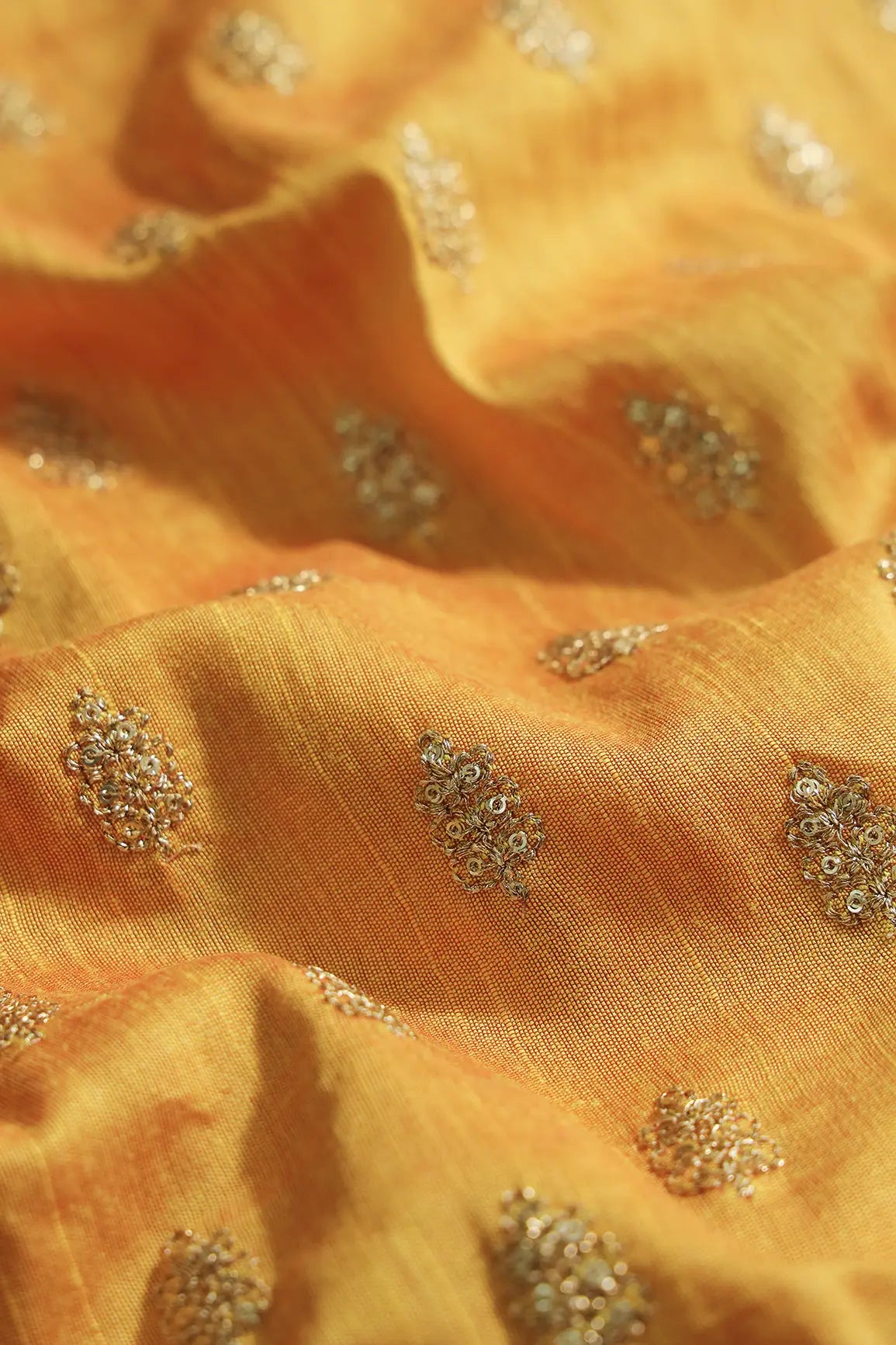 Gold Sequins With Gold Zari Small Motif Embroidery Work On Yellow Raw Silk Fabric