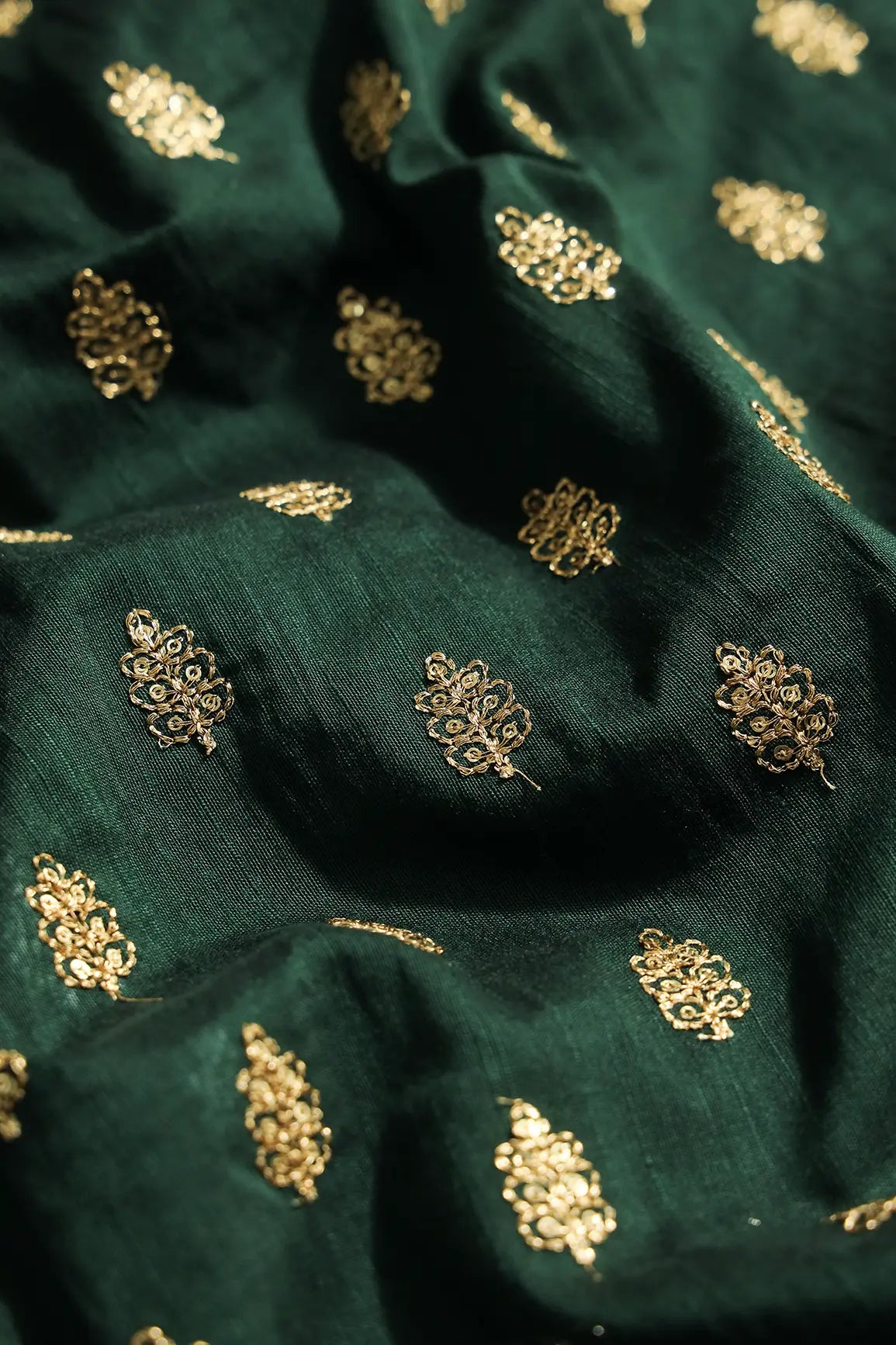 Gold Sequins With Gold Zari Small Motif Embroidery Work On Bottle Green Raw Silk Fabric