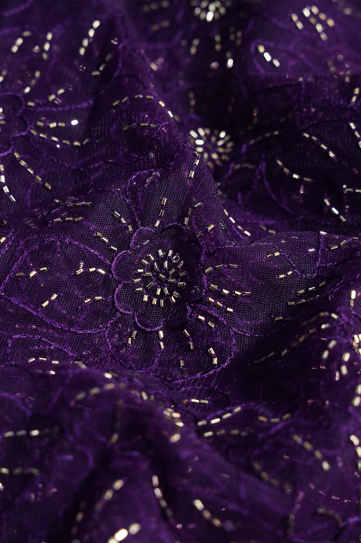 Purple Thread With Beads Floral Embroidery Work On Purple Soft Net Fabric