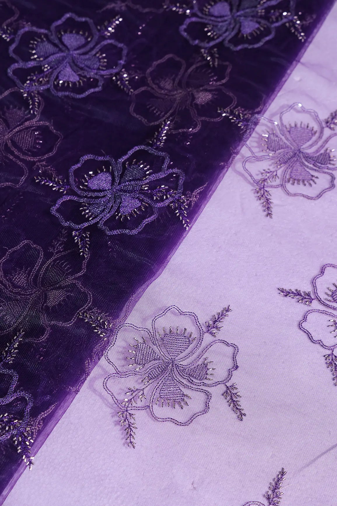 Purple Thread & Gold Beads With Water Sequins Floral Embroidery On Purple Soft Net Fabric