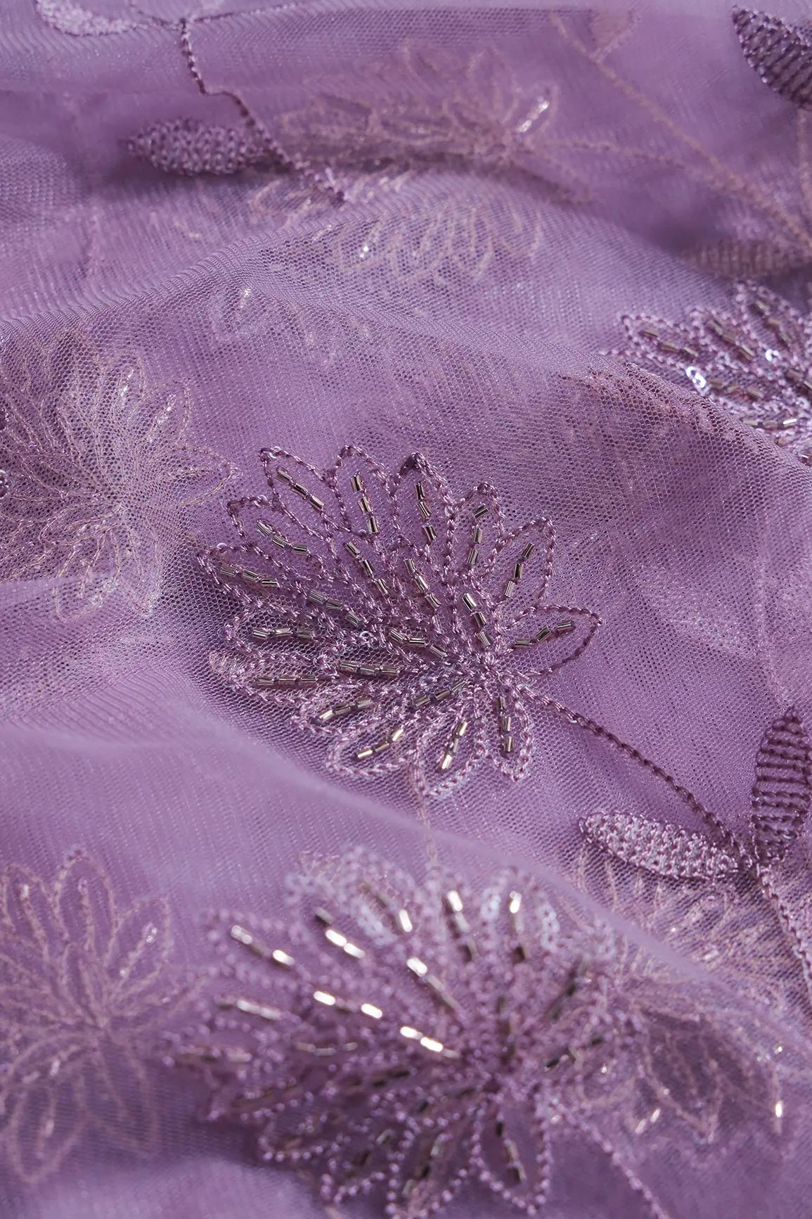 Lilac Thread & Gold Beads With Water Sequins Floral Embroidery On Lilac Soft Net Fabric