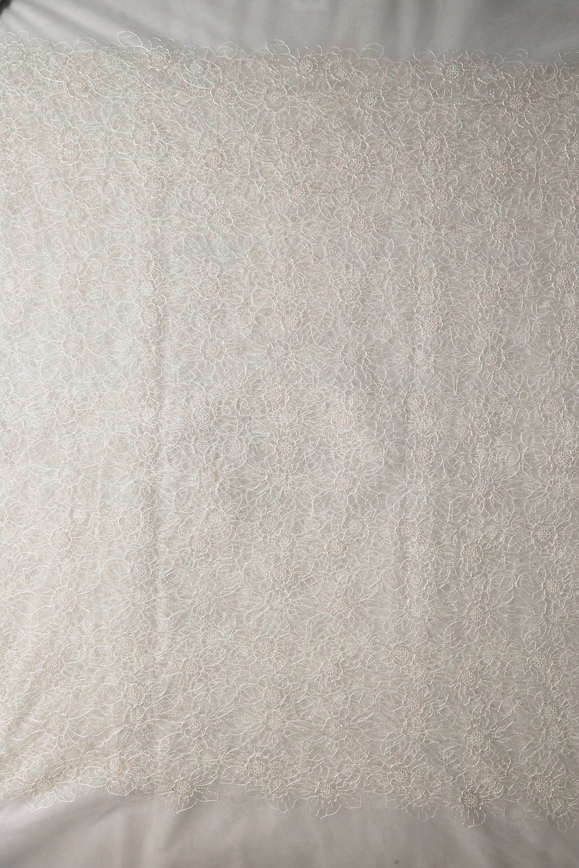 White Thread With Beads Floral Embroidery Work On White Dyeable Soft Net Fabric