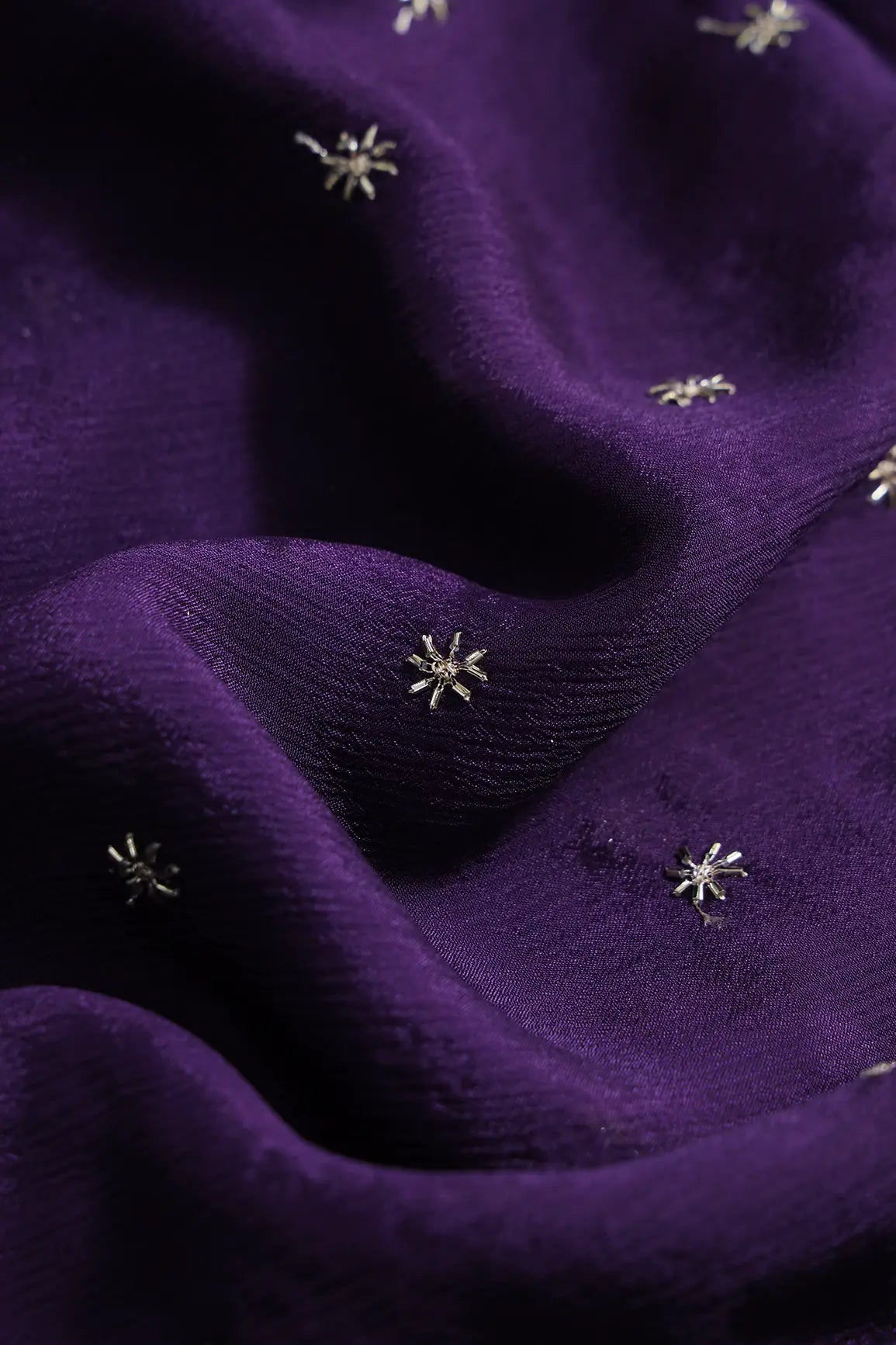 Gold Beads Cut Dana Motif Embroidery Work On Purple Chinnon Chiffon Fabric