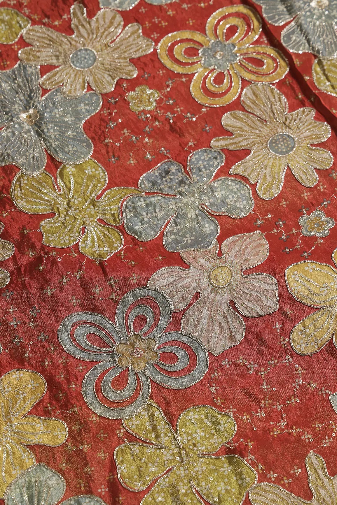 Floral Positional Print On Sequins With Zari Embroidery On Rust Viscose Zari Tissue Fabric