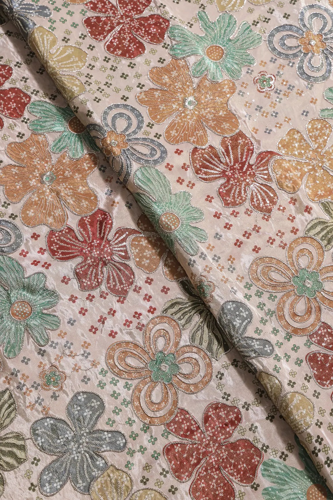 Floral Positional Print On Sequins With Zari Embroidery On Light Peach Viscose Zari Tissue Fabric