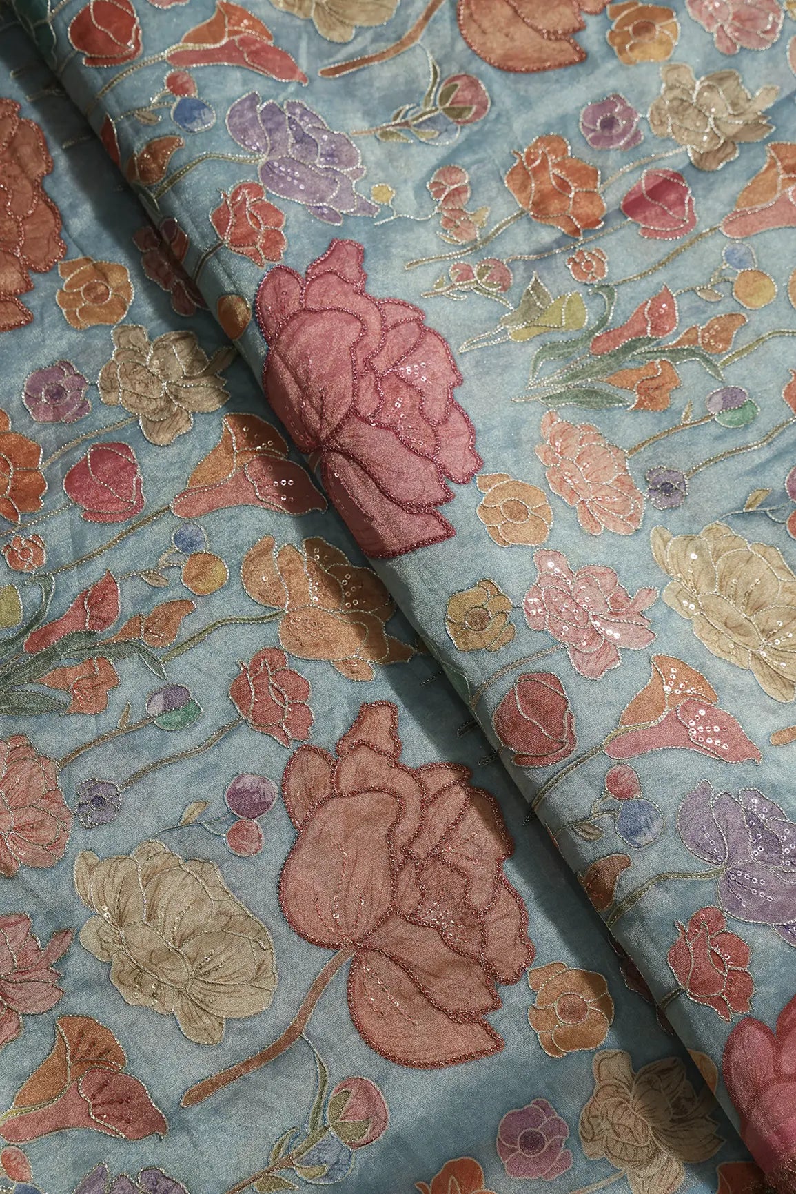 Floral Positional Print On Sequins With Zari Embroidery On Teal Zari Tissue Fabric