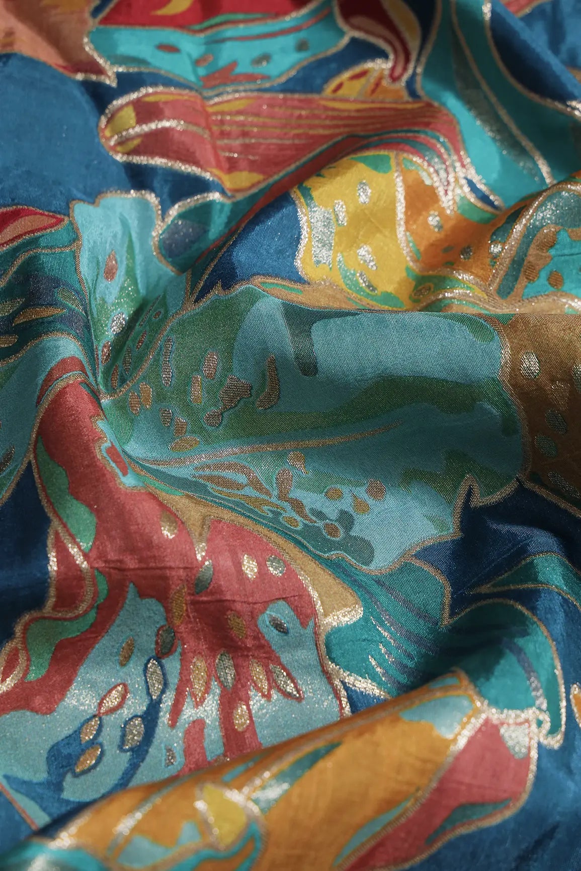 Positional Floral Zari Print On Rama Viscose Dola Silk Jacquard Fabric
