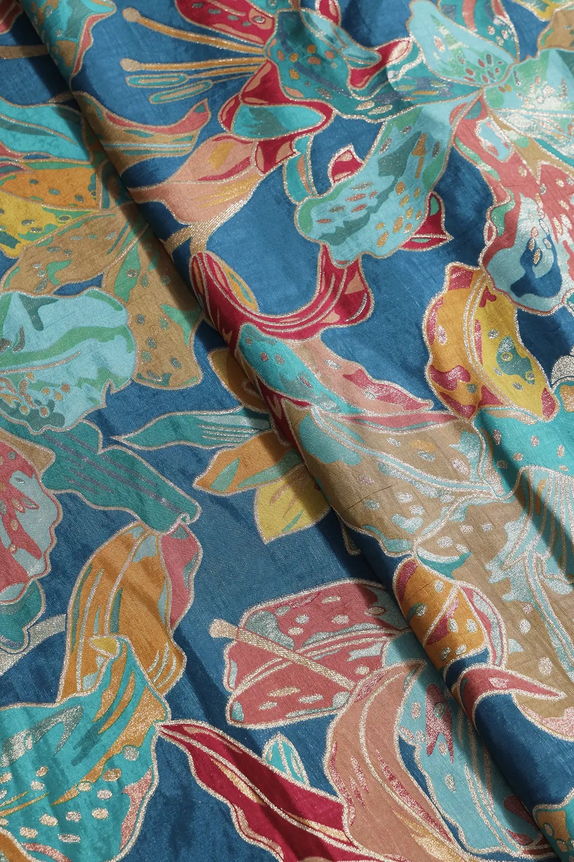 Positional Floral Zari Print On Rama Viscose Dola Silk Jacquard Fabric