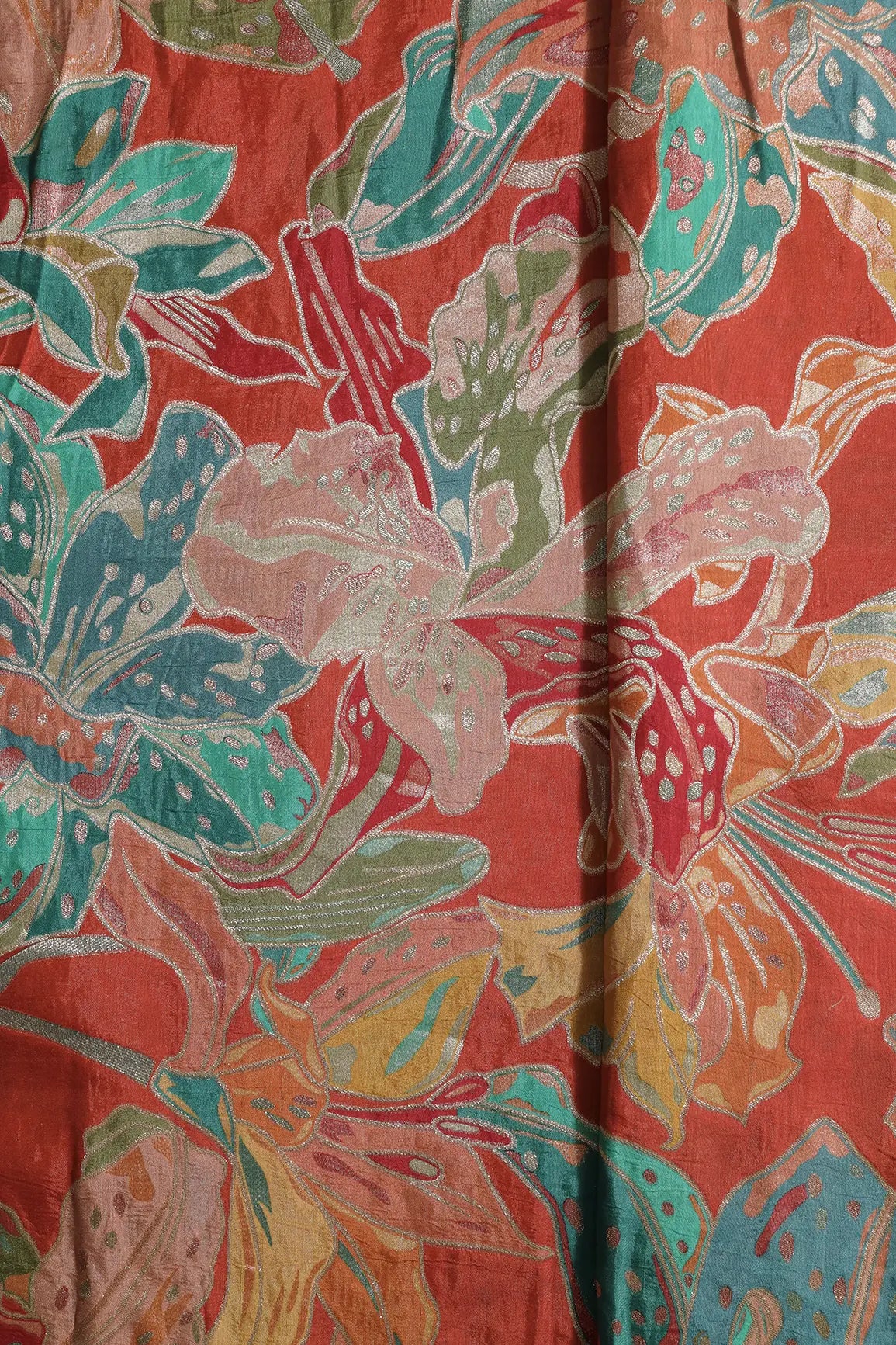 Positional Floral Zari Print On Rust Orange Viscose Dola Silk Jacquard Fabric