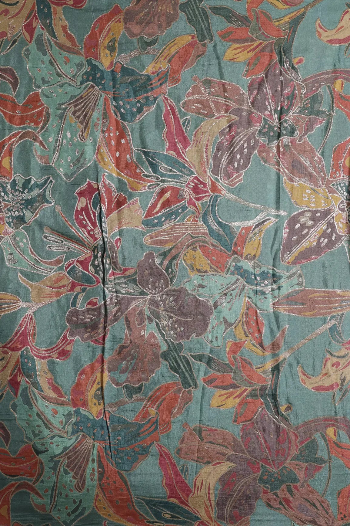 Positional Floral Zari Print On Teal Viscose Dola Silk Jacquard Fabric