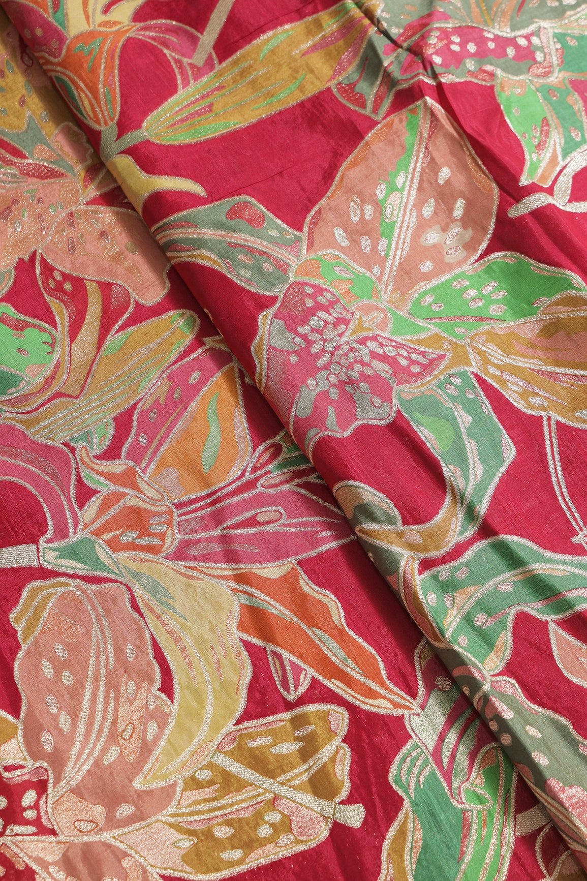 Positional Floral Zari Print On Fuchsia Viscose Dola Silk Jacquard Fabric