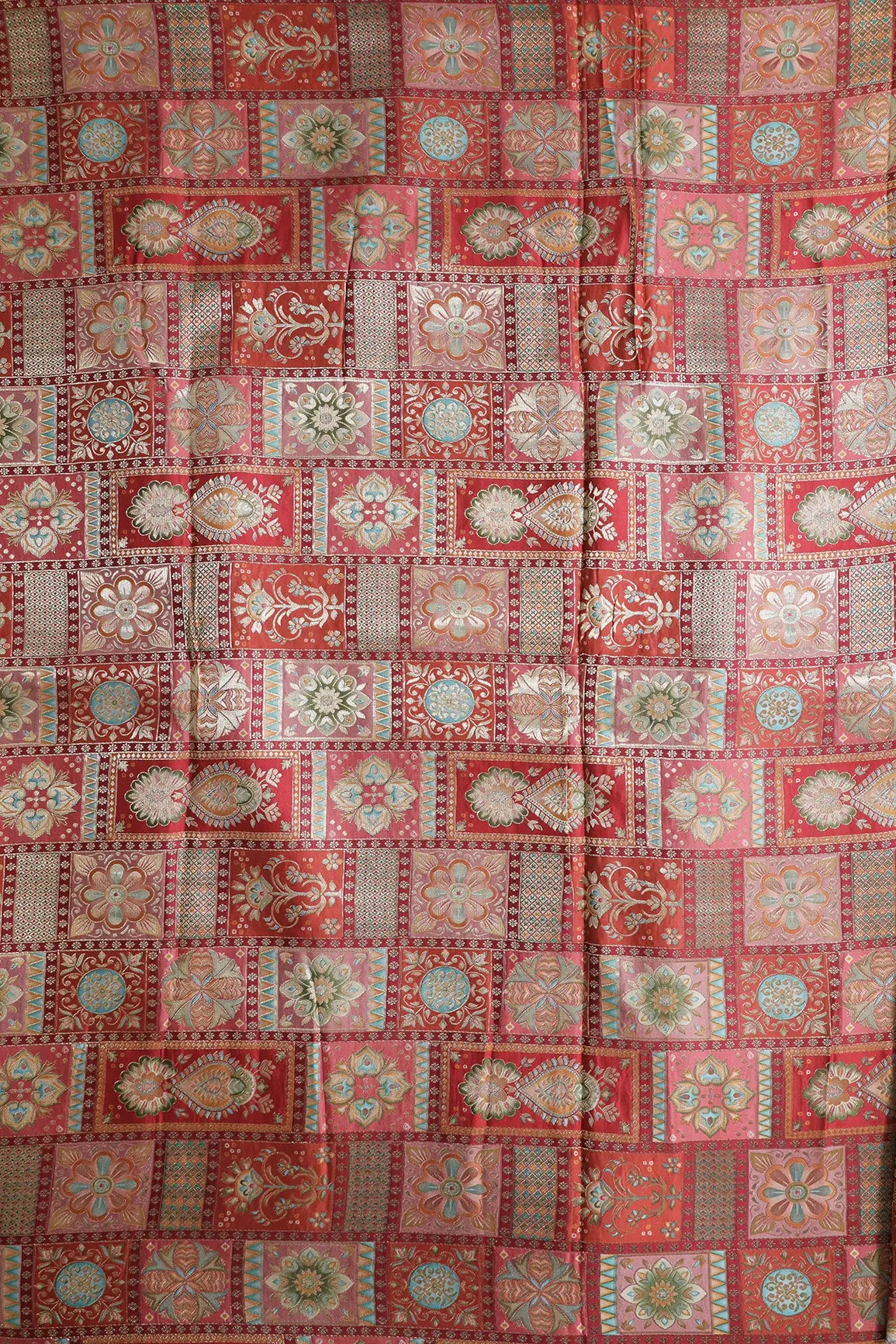 Positional Floral Zari Print On Red Viscose Dola Silk Jacquard Fabric