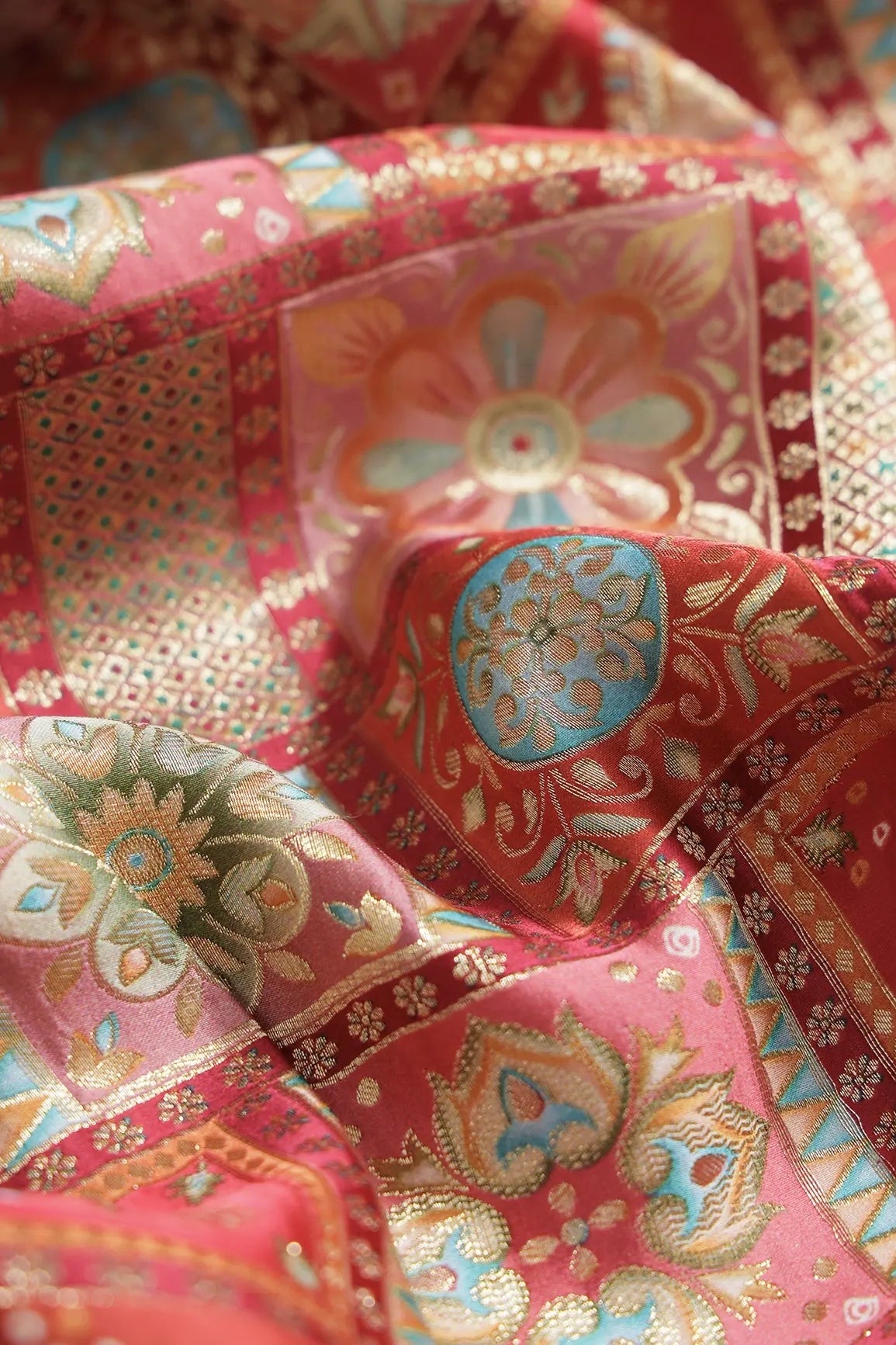 Positional Floral Zari Print On Red Viscose Dola Silk Jacquard Fabric