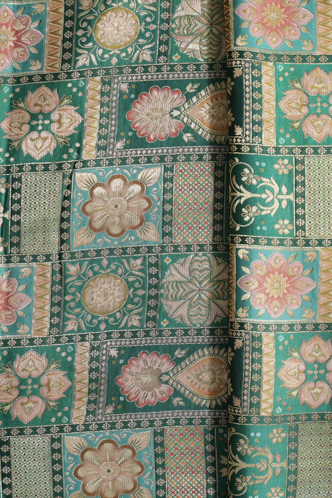 Positional Floral Zari Print On Green Viscose Dola Silk Jacquard Fabric