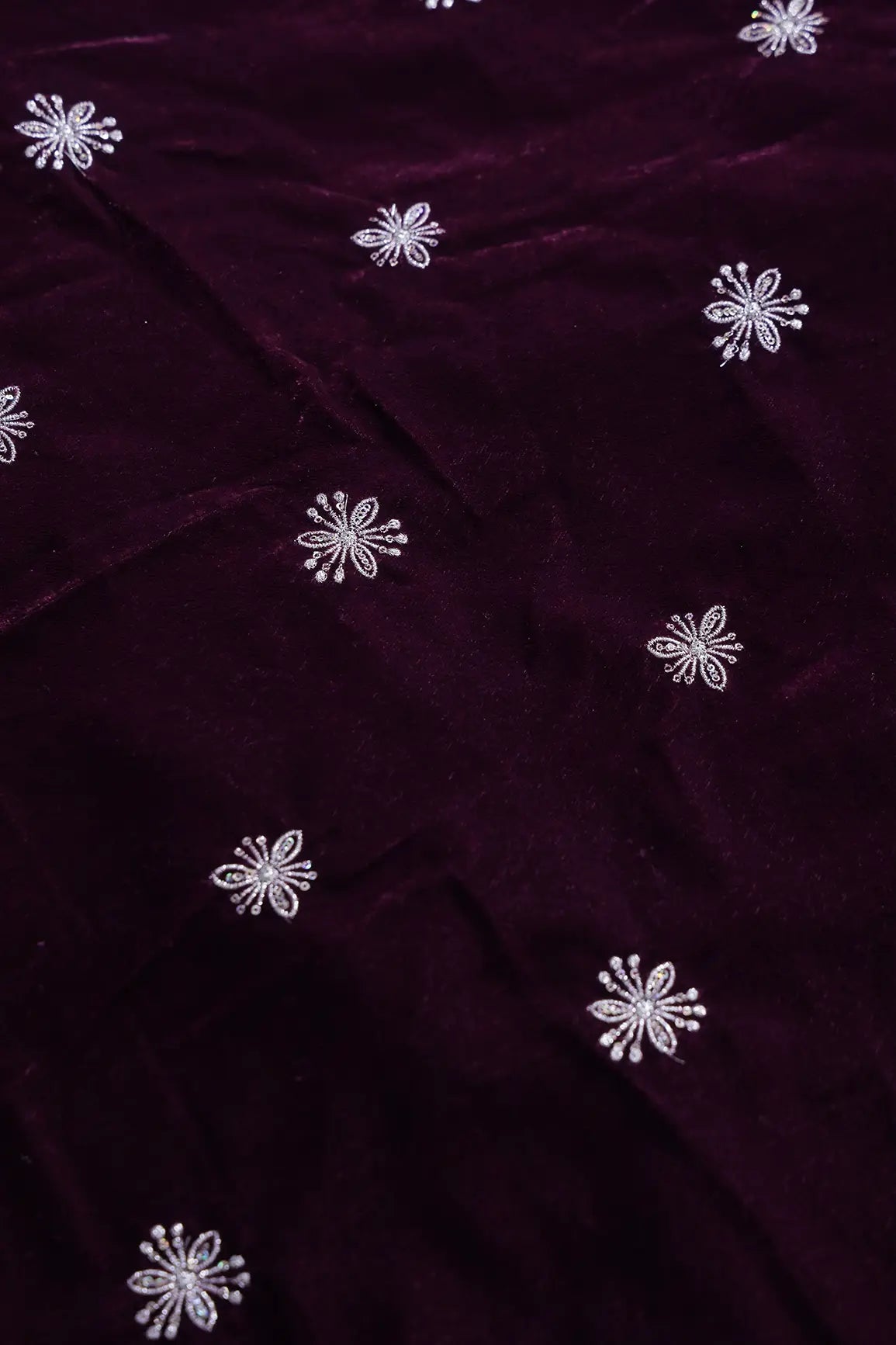 Gold Sequins With Gold Zari Small Floral Motif Embroidery Work On Wine Velvet Fabric
