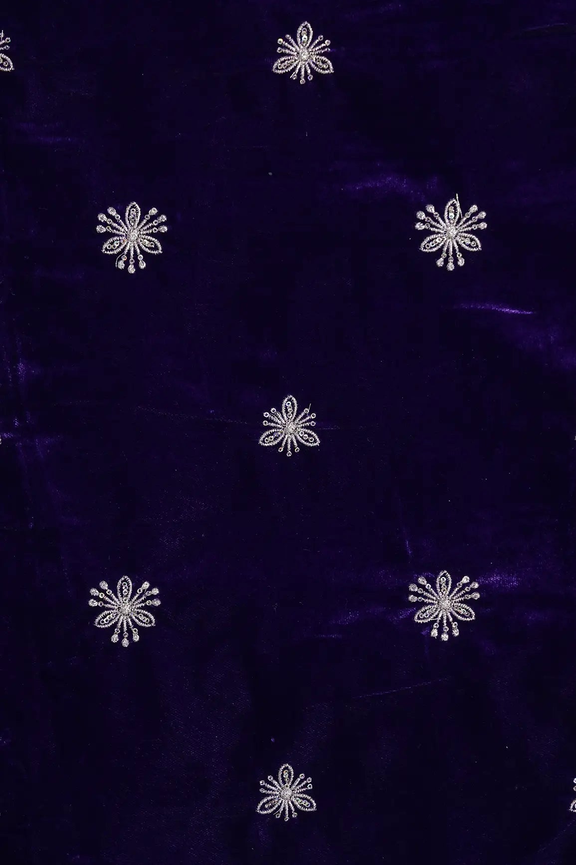 Gold Sequins With Gold Zari Small Floral Motif Embroidery Work On Purple Velvet Fabric