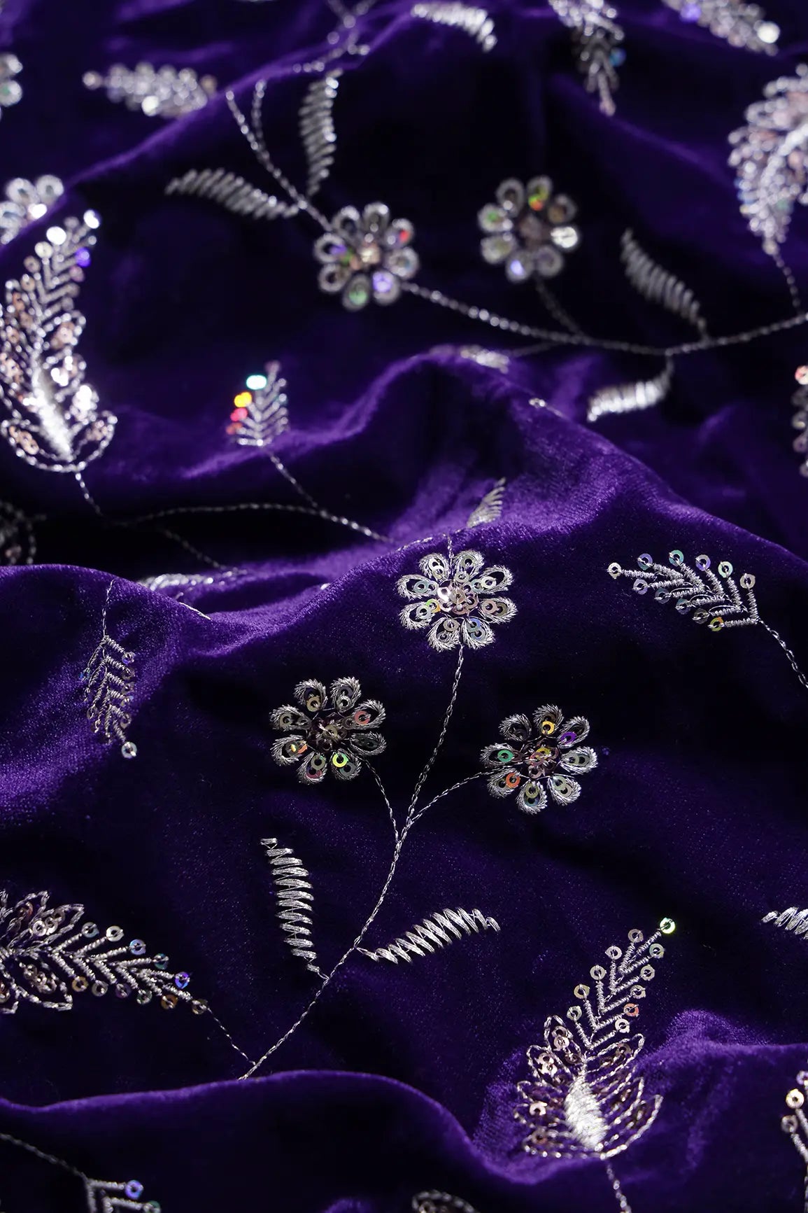 Gold Sequins With Gold Zari Floral Leafy Embroidery Work On Purple Velvet Fabric