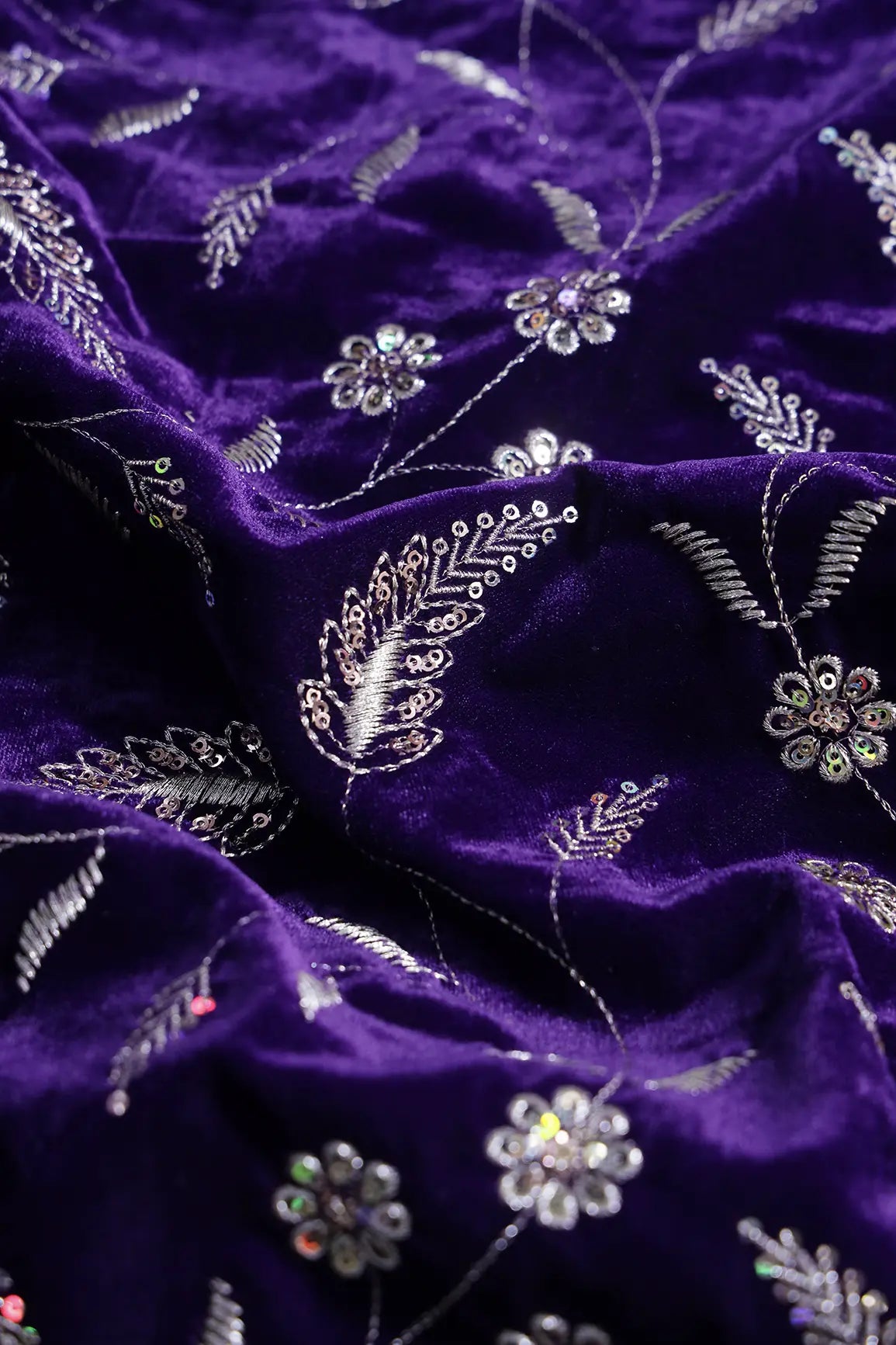 Gold Sequins With Gold Zari Floral Leafy Embroidery Work On Purple Velvet Fabric