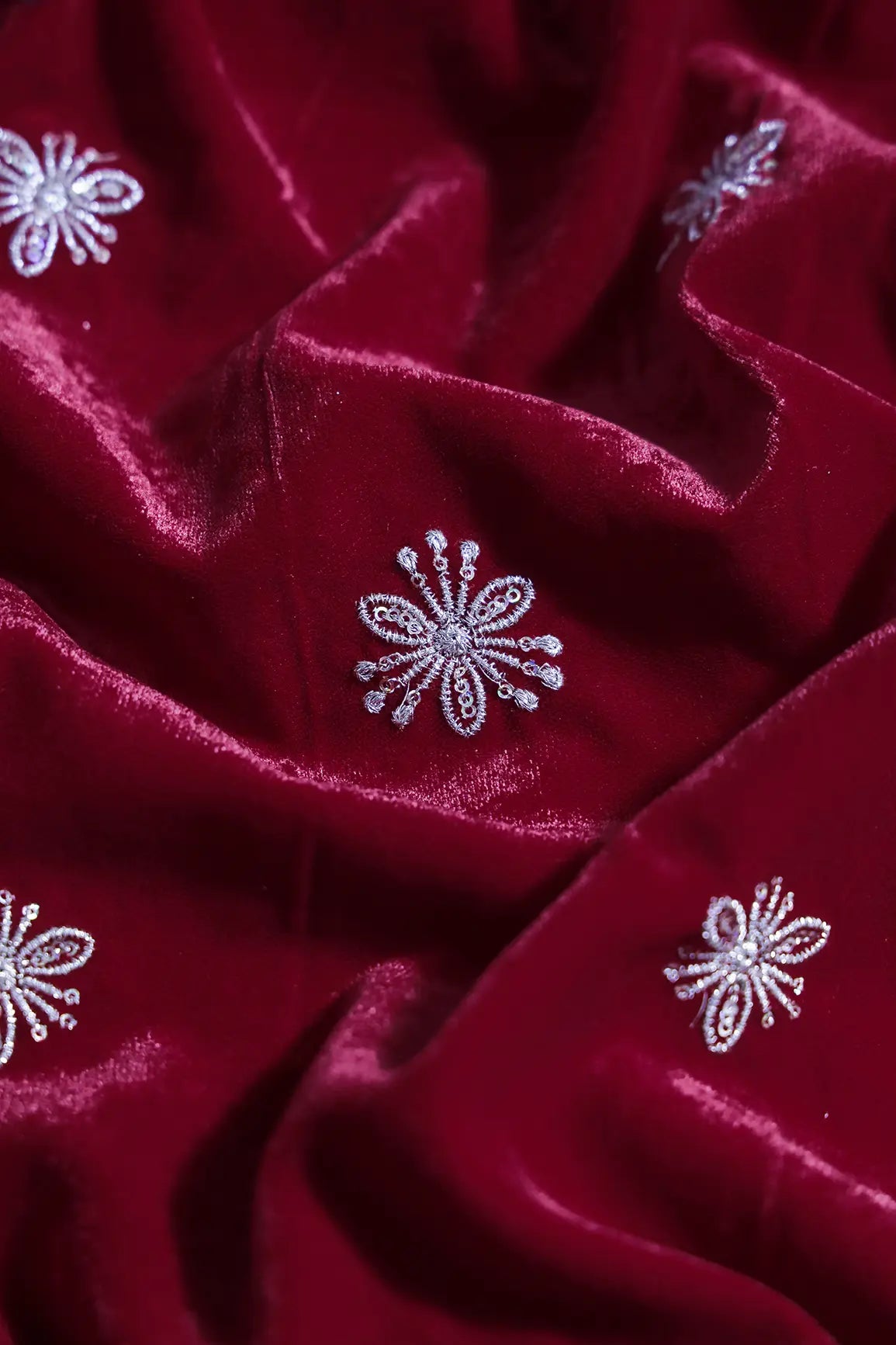 Gold Sequins With Gold Zari Small Floral Motif Embroidery Work On Red Velvet Fabric