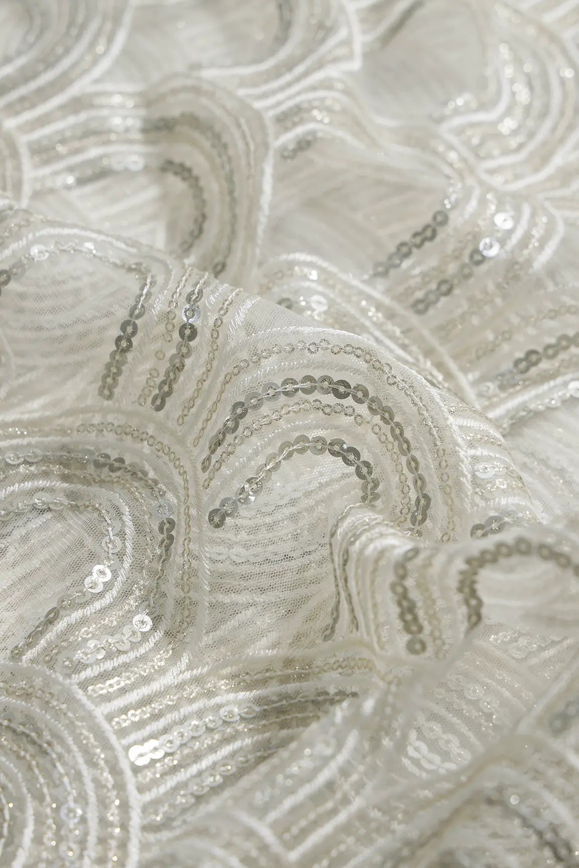 Off White Thread With Silver Sequins Abstract Embroidery Work On Off White Soft Net Fabric