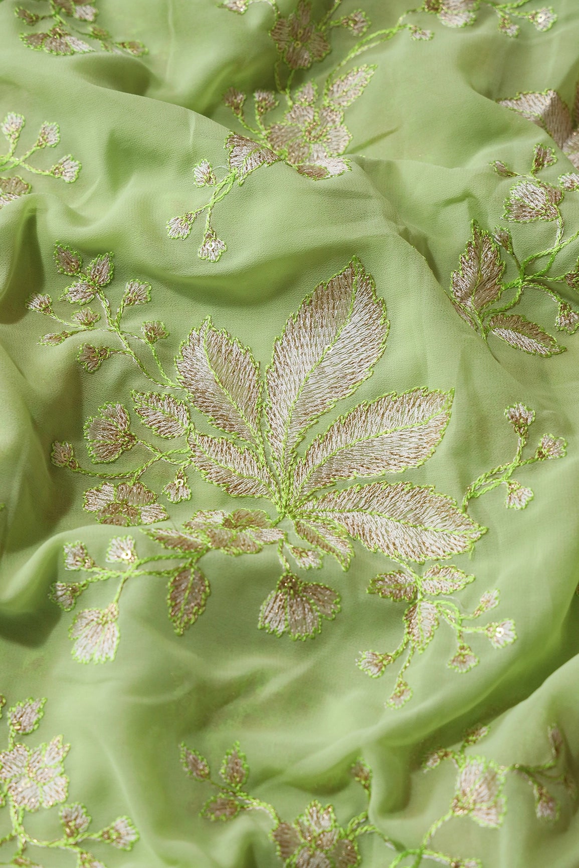 Gold Sequins With Cream Thread Floral Embroidery Work On Parrot Green Georgette Fabric