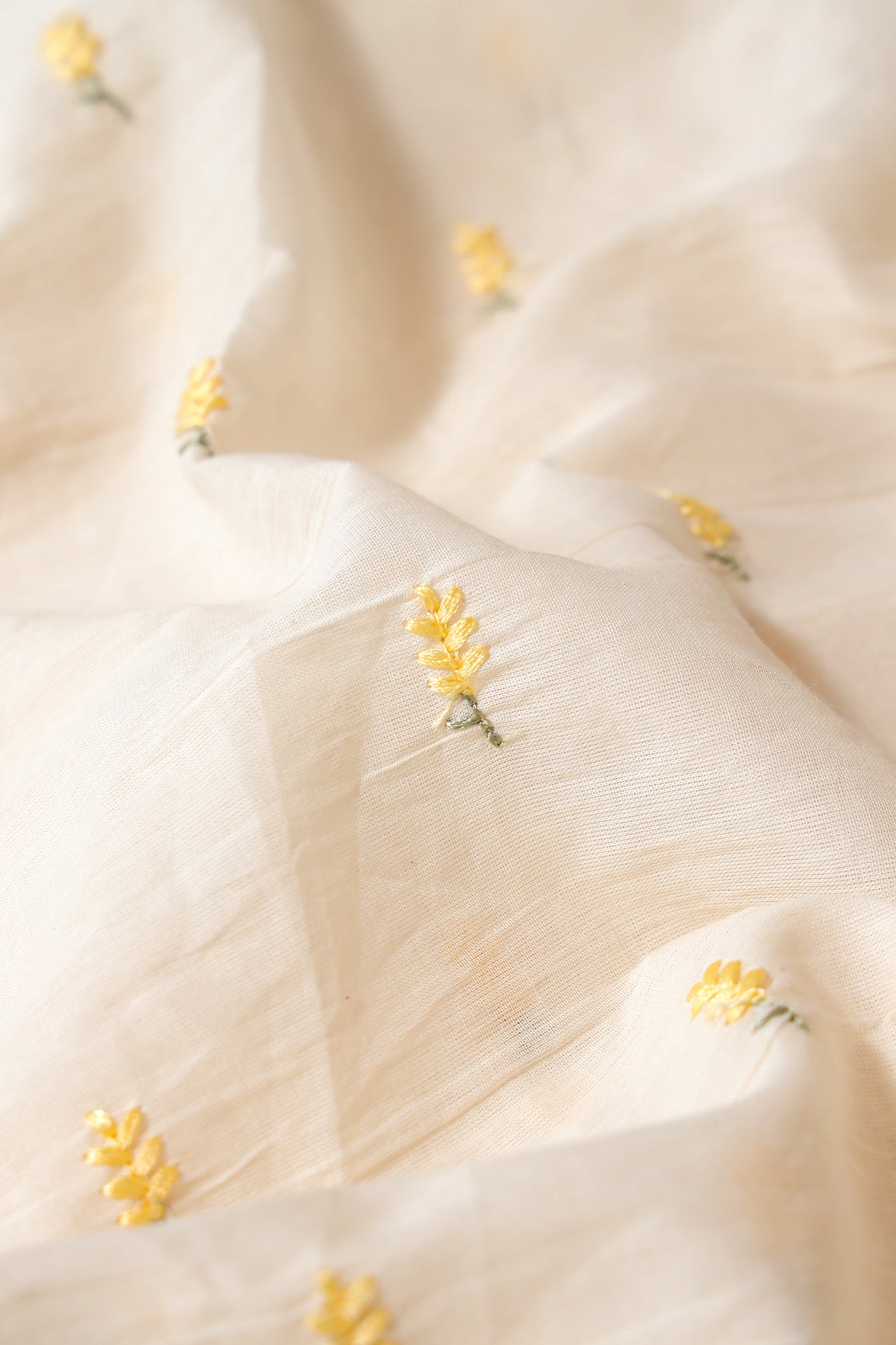 Pastel Yellow Small Leafy Embroidery On Off White Pure Cotton Fabric