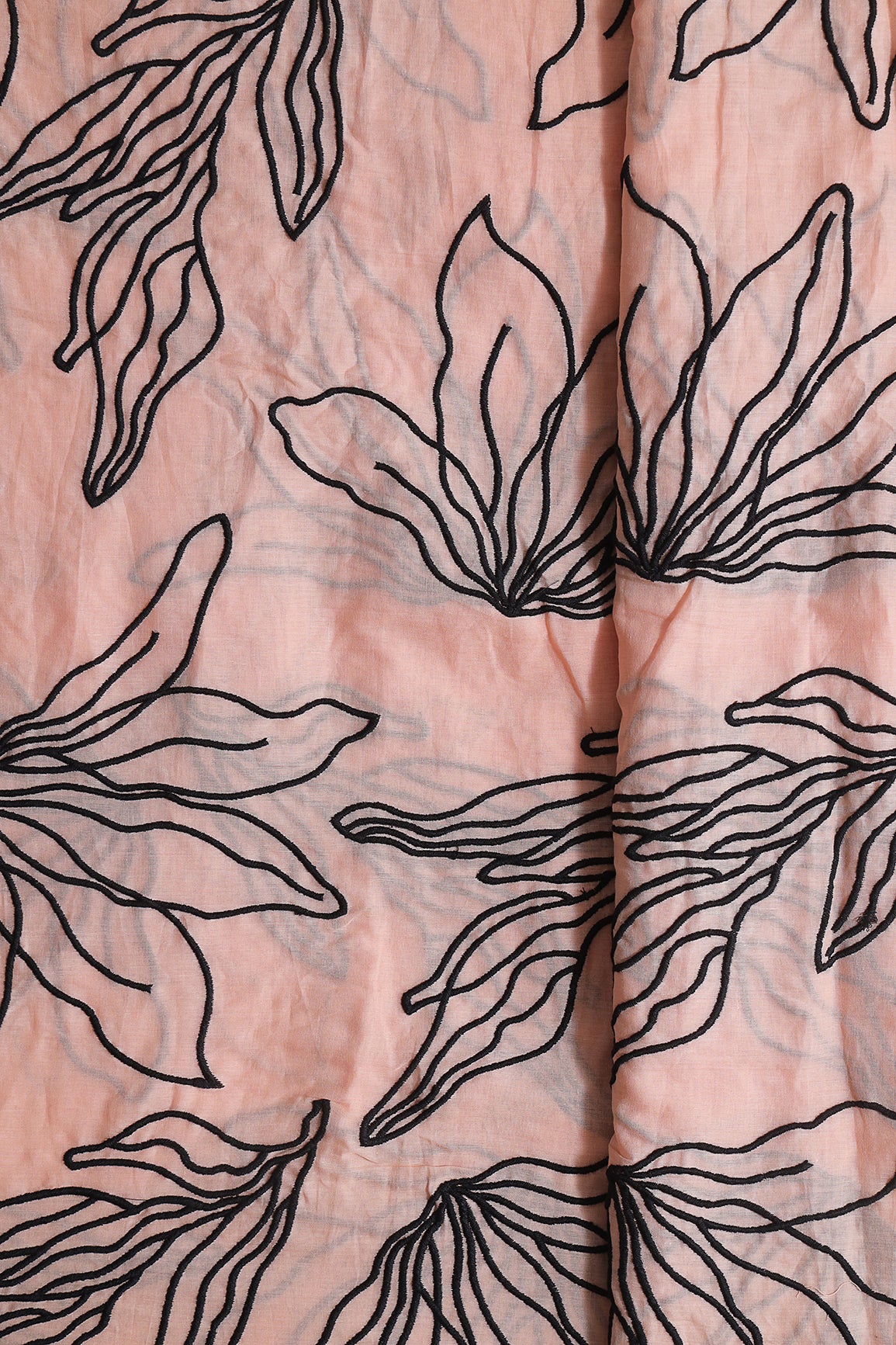 Beautiful Black Floral Embroidery On Peach Pure Mul Cotton Fabric