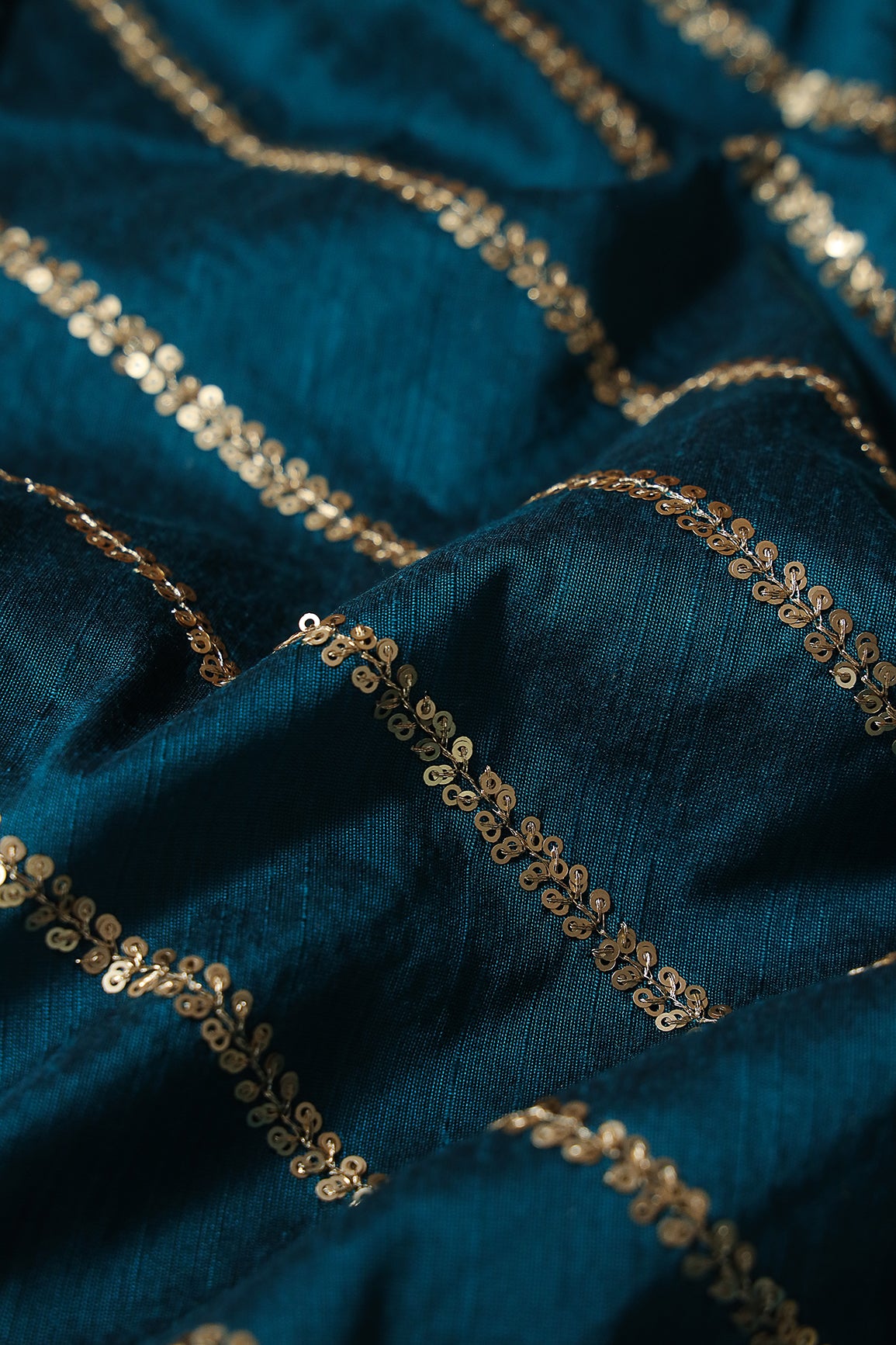 Gold Sequins With Gold Zari Stripes Embroidery Work On Rama Raw Silk Fabric