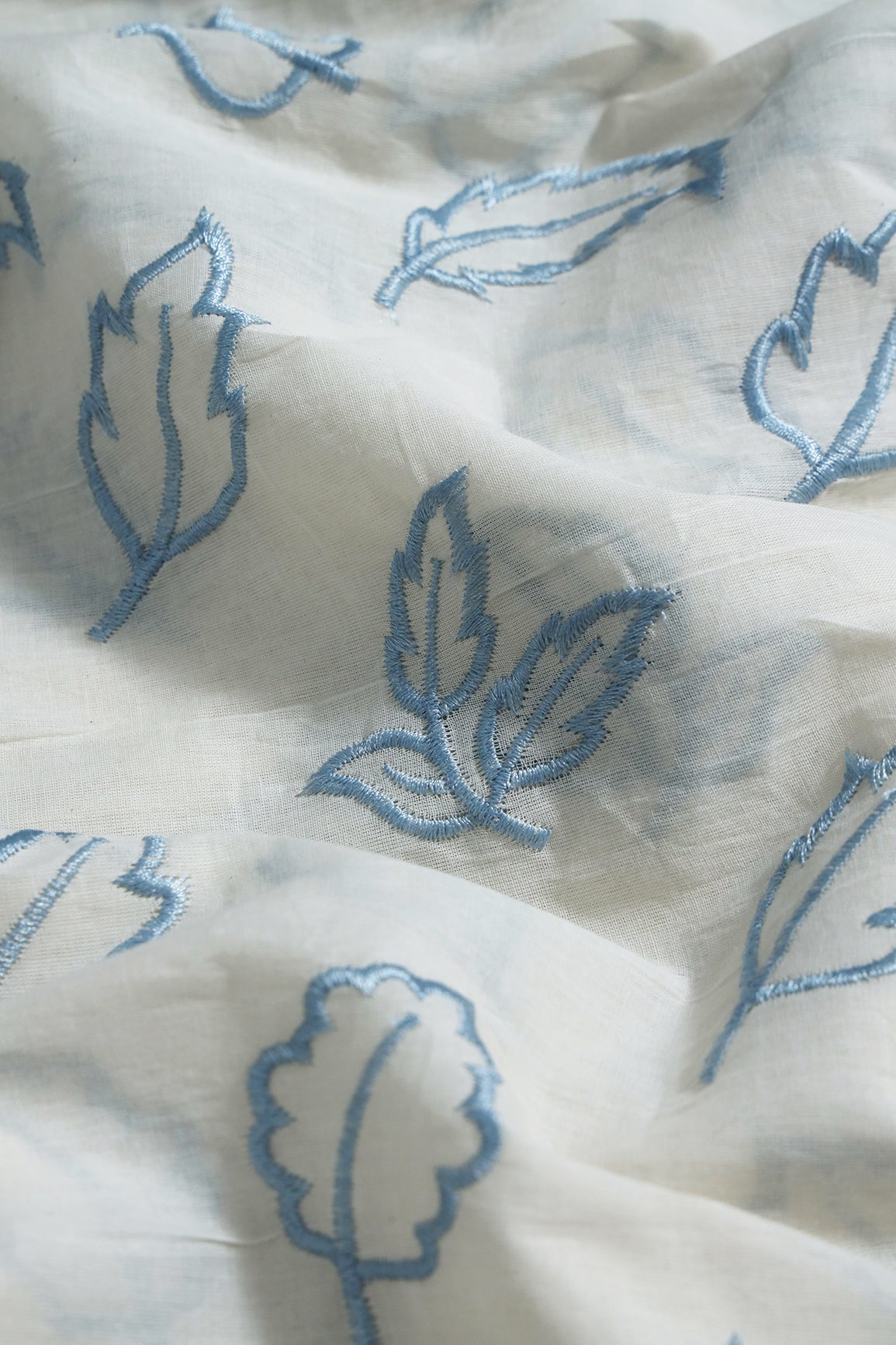 Beautiful Blue Leafy Embroidery On Off White Organic Cotton Fabric
