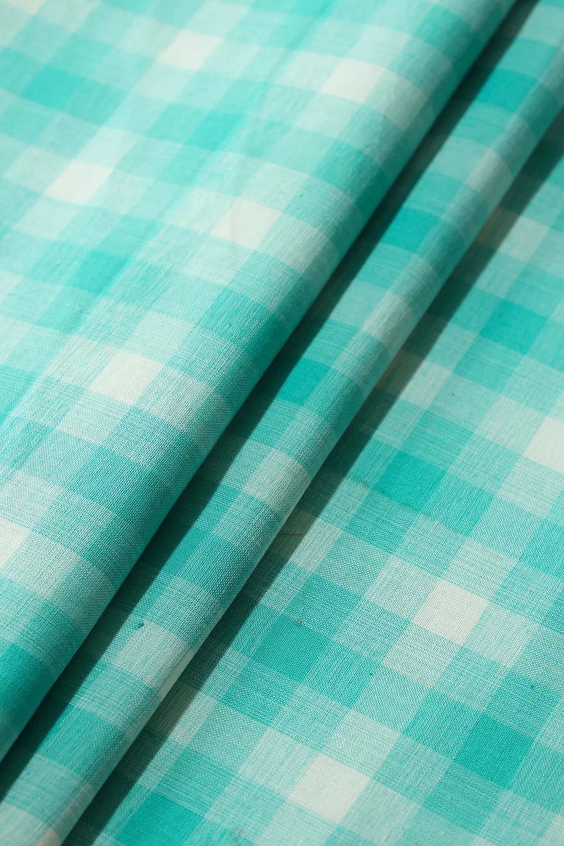 Turquoise And White Checks Pattern Handwoven Organic Cotton Fabric
