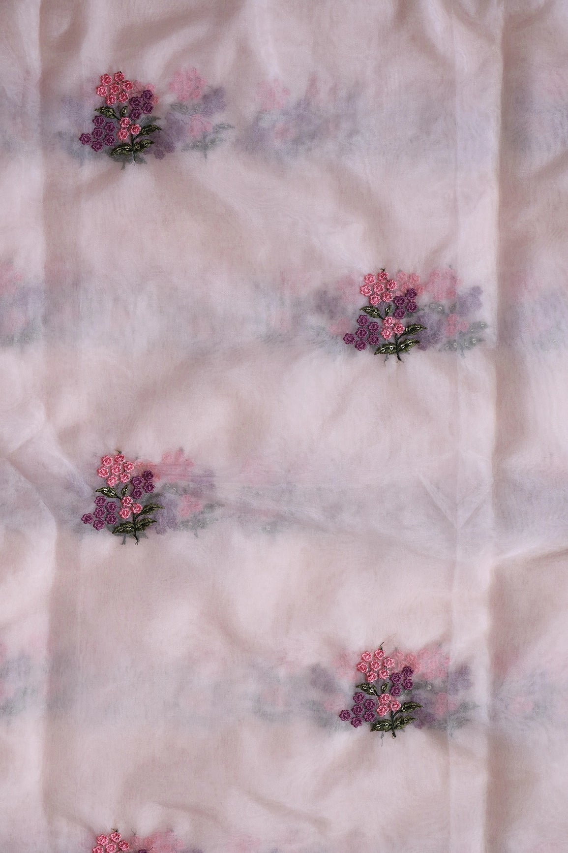 Pink And Mauve Thread With Sequins Floral Embroidery Work On Pastel Peach Organza Fabric