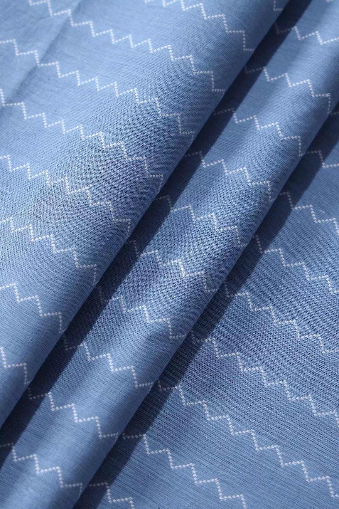 Pastel Blue And White Chevron Pattern On Handwoven Organic Cotton Fabric