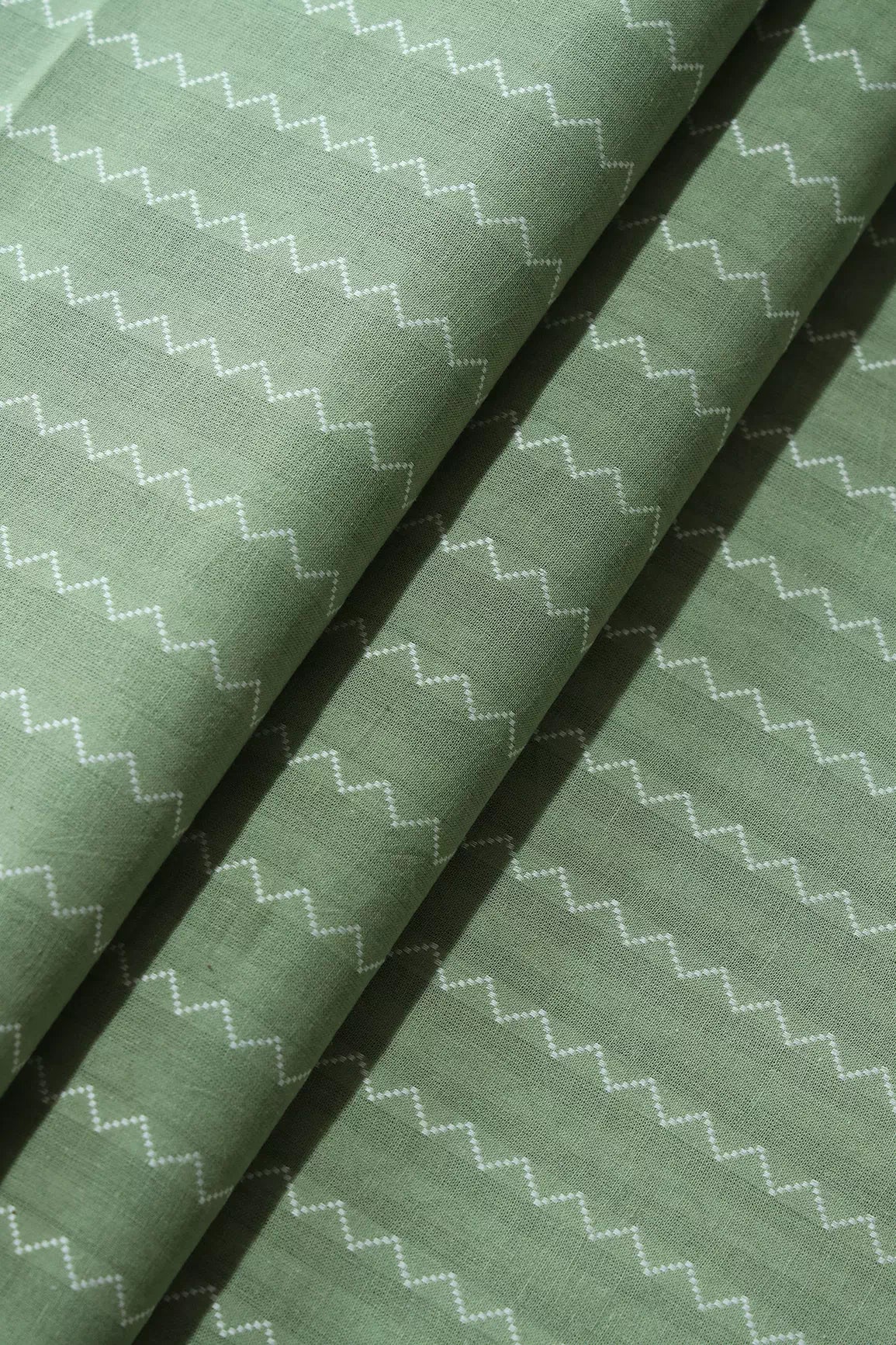 Olive And White Chevron Pattern On Handwoven Organic Cotton Fabric
