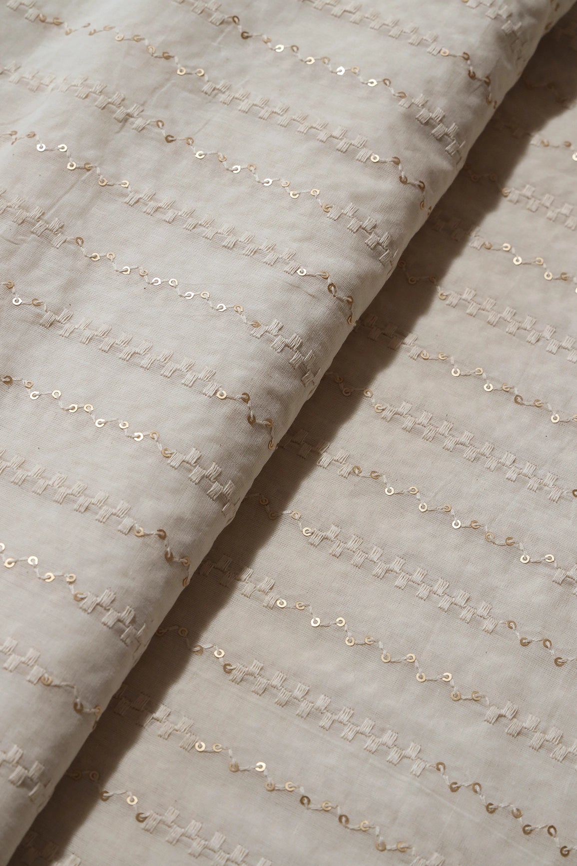 White Thread With Gold Sequins Small Chevron Embroidery Work On Off White Cotton Fabric