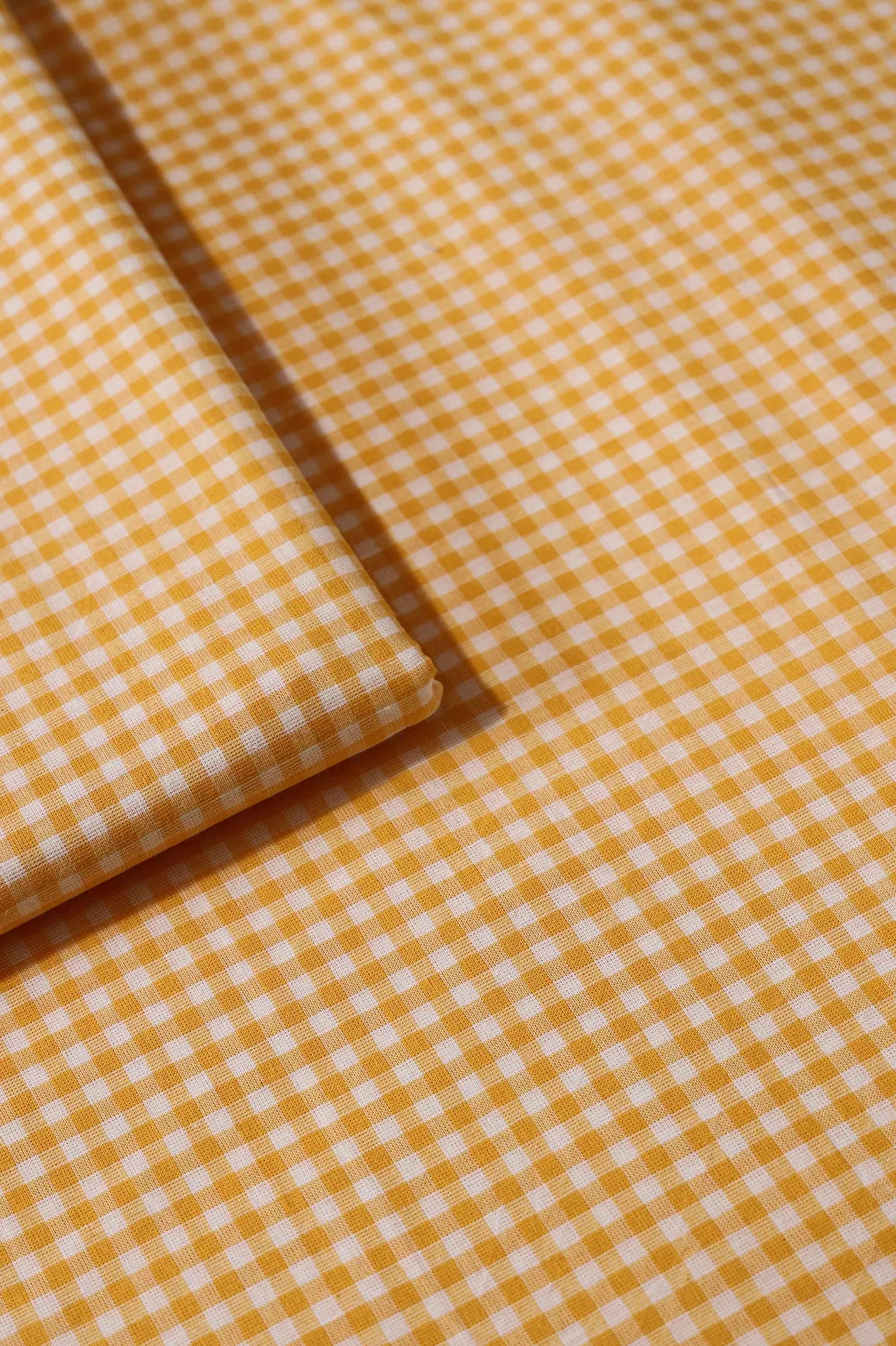 White And Yellow Small Checks Pattern On Handwoven Organic Cotton Fabric