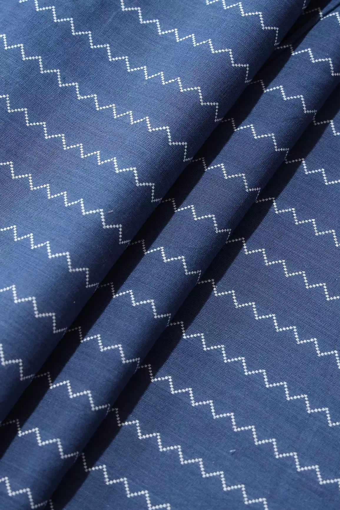 Blue And White Chevron Pattern On Handwoven Organic Cotton Fabric