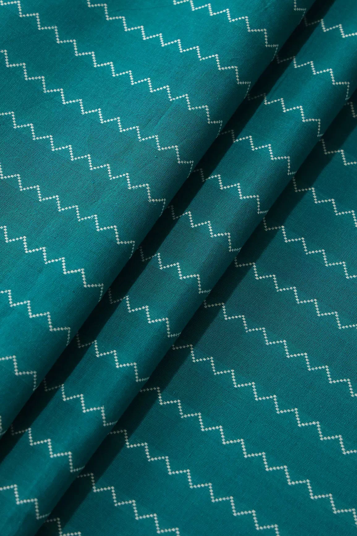 Dark Turquoise And White Chevron Pattern On Handwoven Organic Cotton Fabric