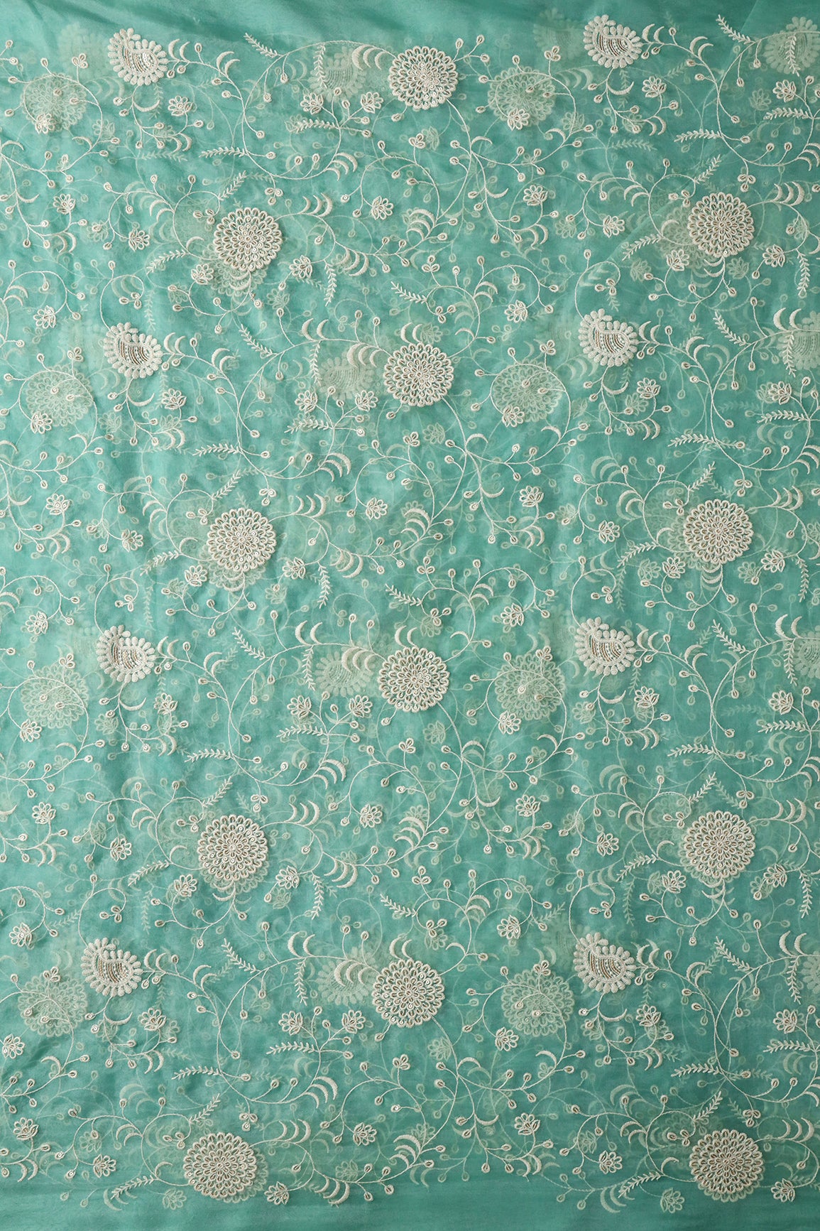 Exclusive Gold Matte Sequins With White Thread Floral Embroidery On Teal Organza Fabric