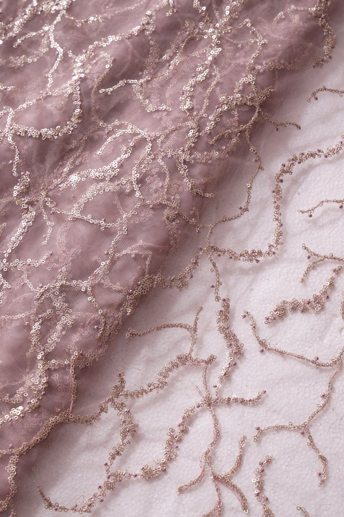 Mauve Thread With Gold Glitter Sequins Abstract Embroidery On Mauve Soft Net Fabric