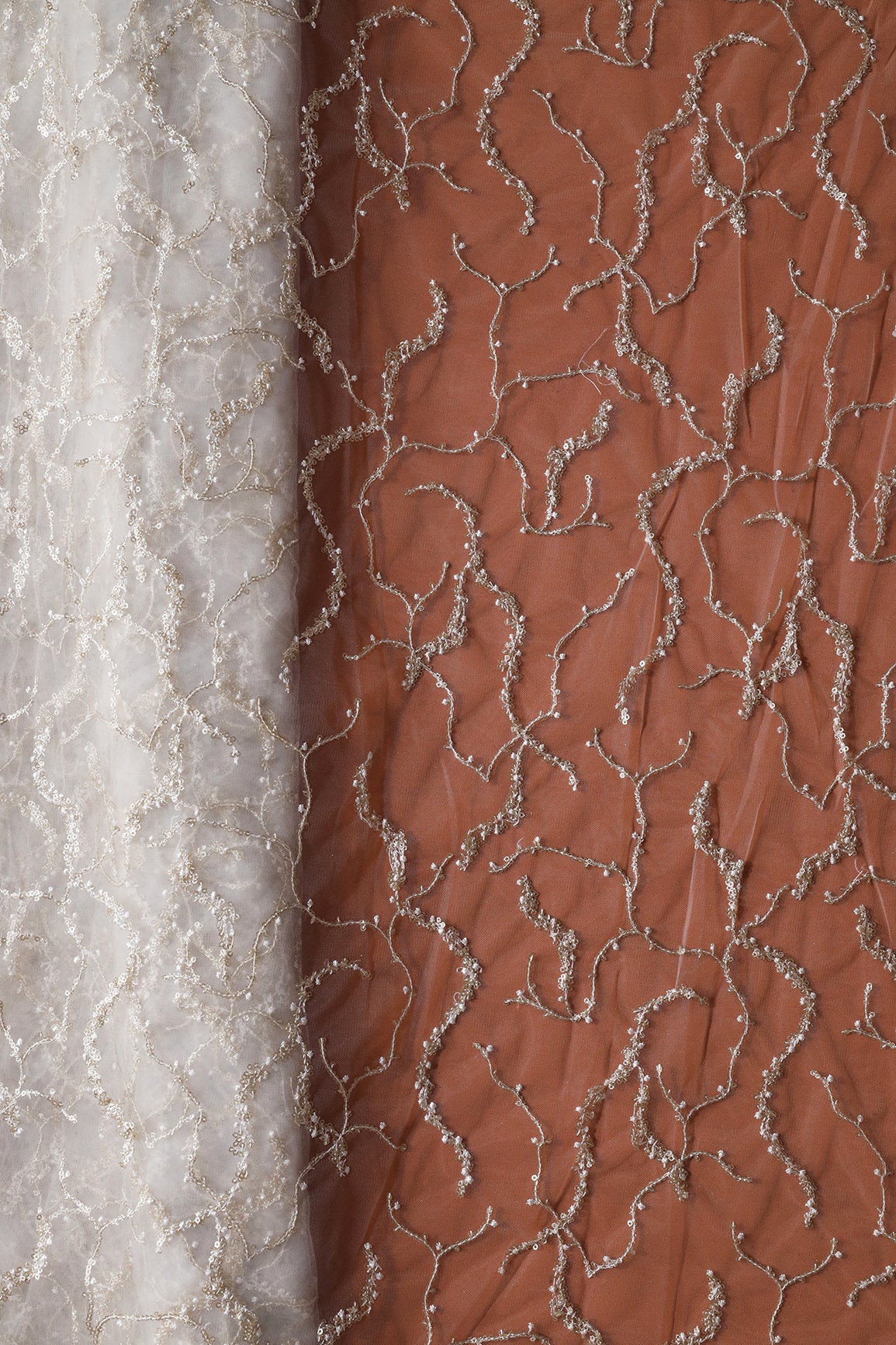 White Thread With Gold Glitter Sequins Abstract Embroidery On White Dyeable Soft Net Fabric