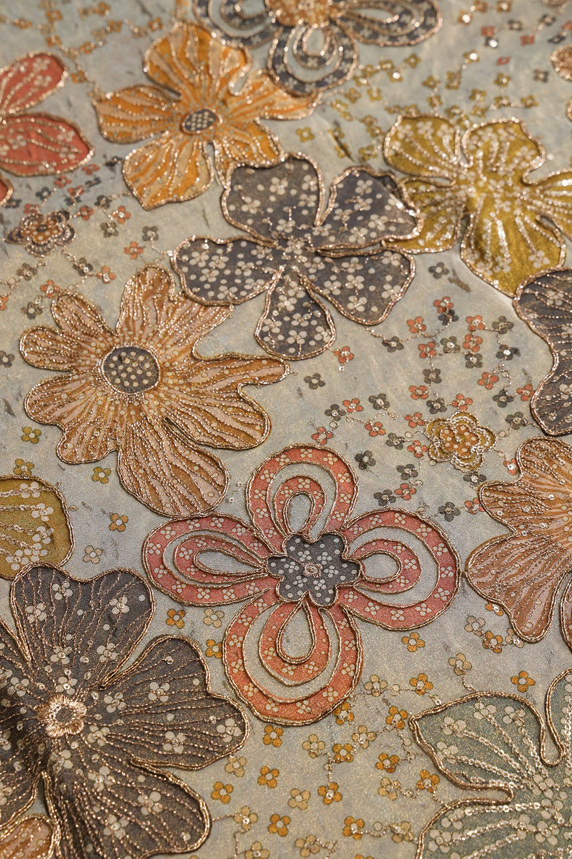 Floral Position Print On Sequins With Zari Embroidery On Pastel Grey Viscose Zari Tissue Fabric