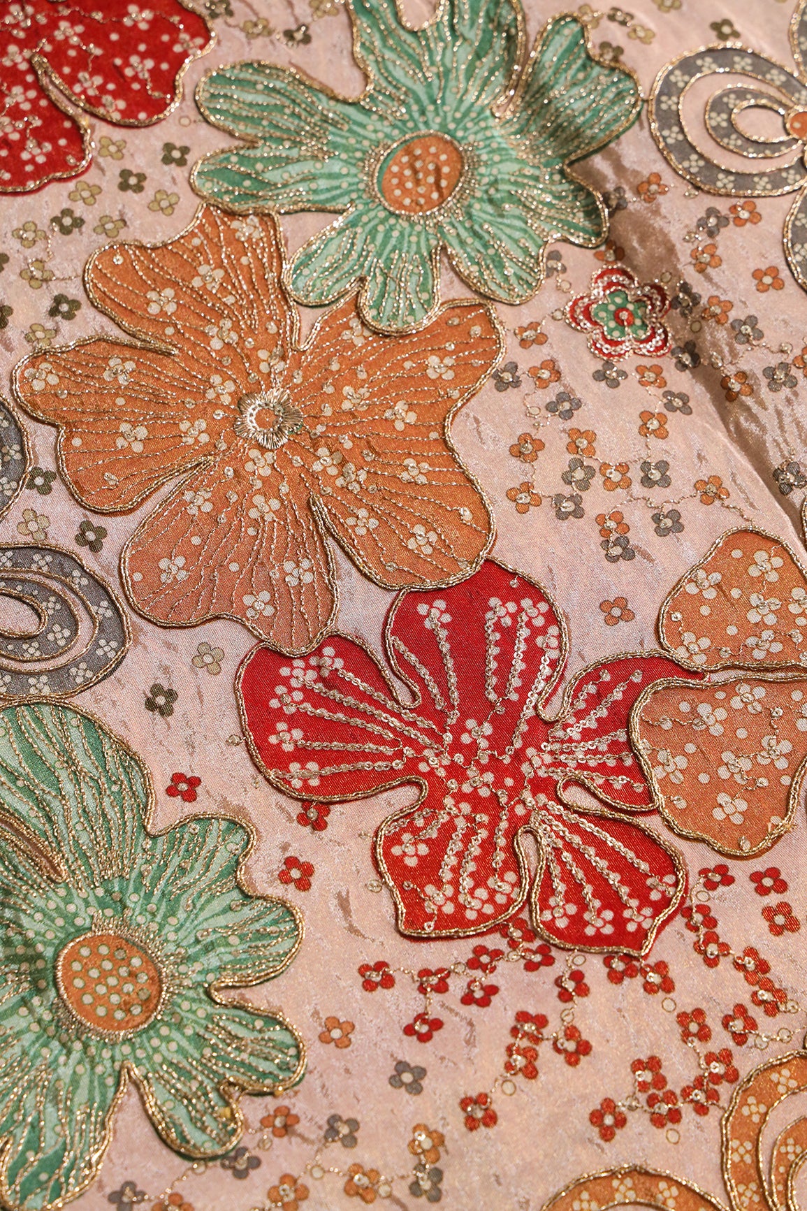Floral Position Print On Sequins With Zari Embroidery On Light Peach Viscose Zari Tissue Fabric